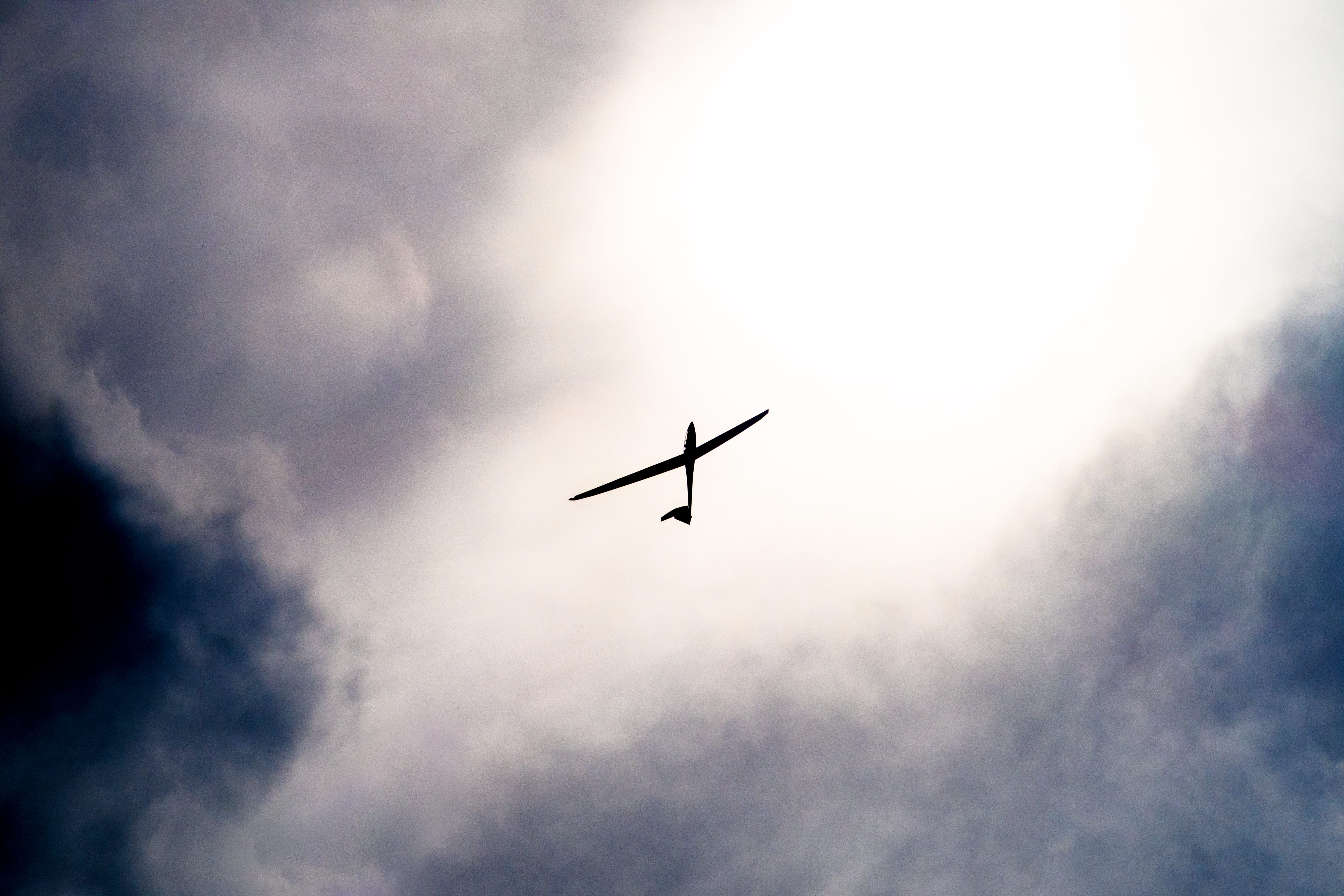 plane, drone, day, directly below, transportation, mid-air, motion, outdoors, cloud - sky, overcast, 5K, no people, white, sunlight, silhouette, low angle view, HD Wallpaper