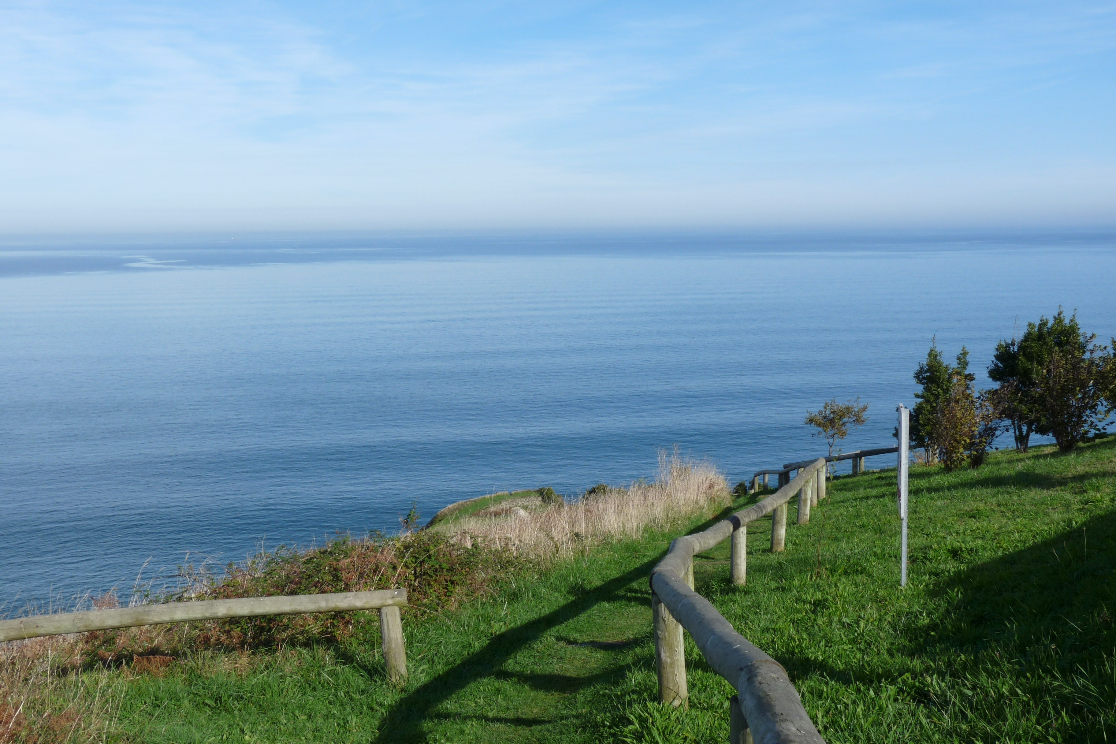 horizon over water, no people, coastline, water, cantabria, beauty in nature, green color, 2K, landscape, laredo, grass, day, tranquility, sky, land, sea, HD Wallpaper