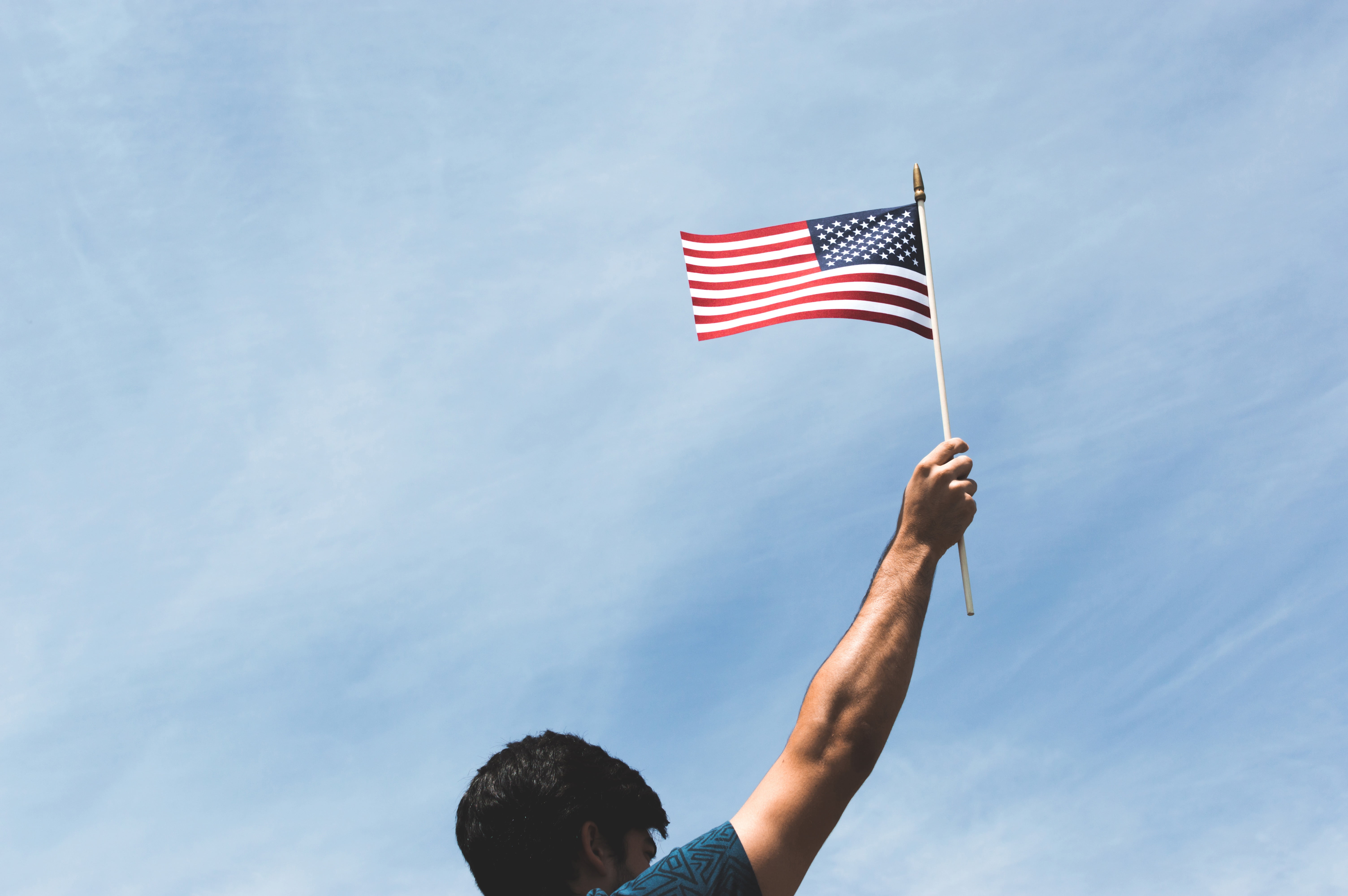blue, one person, patriotism, arms raised, real people, guy, nature, independence, holding, cloud - sky, outdoors, striped, flag, day, casual clothing, HD Wallpaper