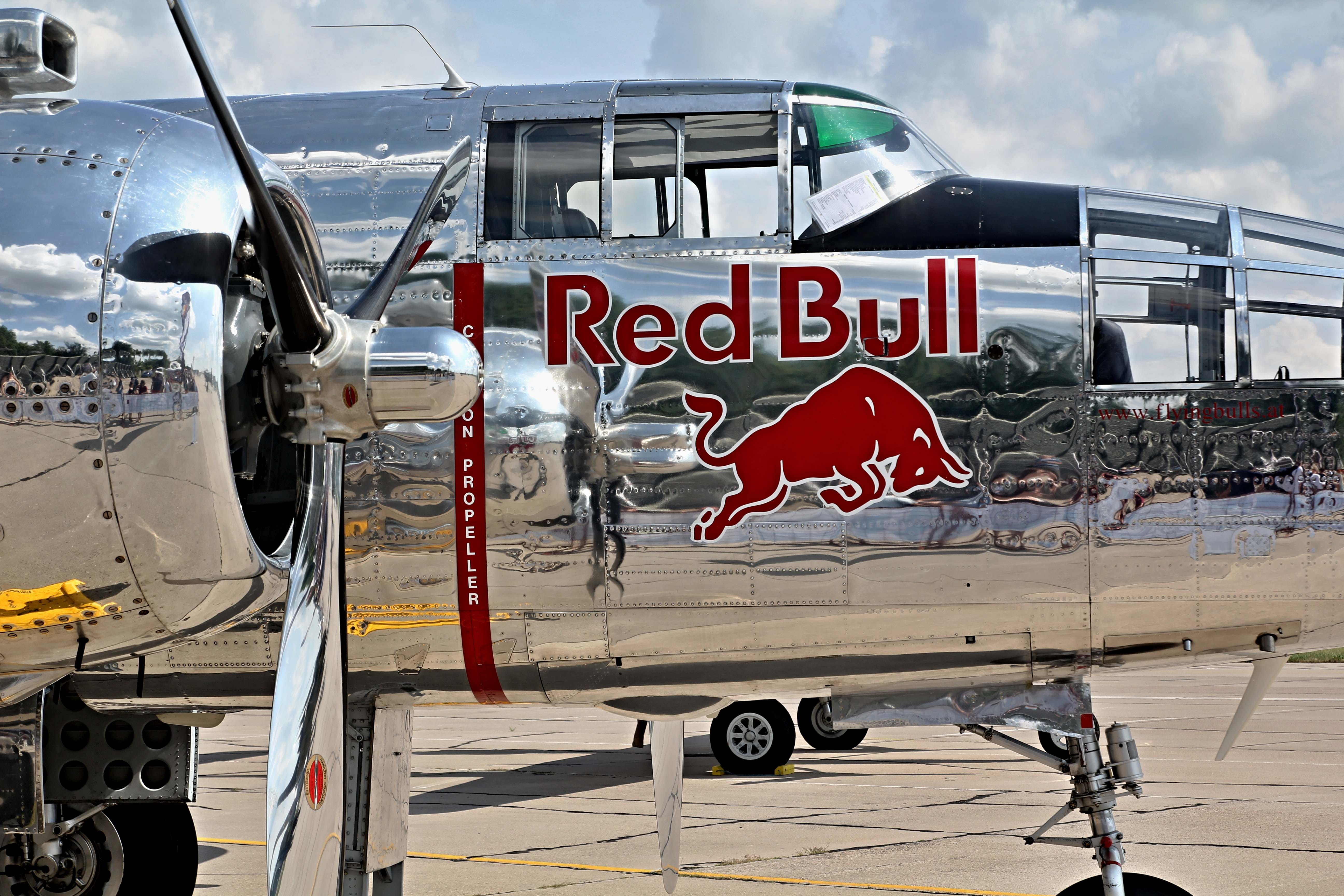land vehicle, bombarder, car, transportation, day, b25, red bull, airport, nature, no people, aircraft, text, road, historic aircraft, communication, air vehicle, HD Wallpaper