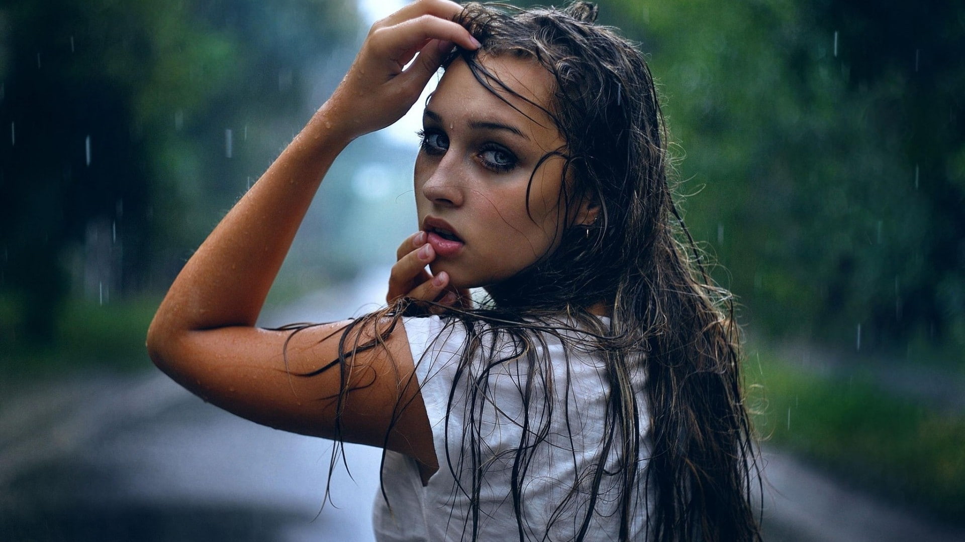 women outdoors, rain, wet hair, looking at viewer, wet, long hair, finger on lips, open mouth, 1080P, women, looking back, trees, blue eyes, water drops, HD Wallpaper