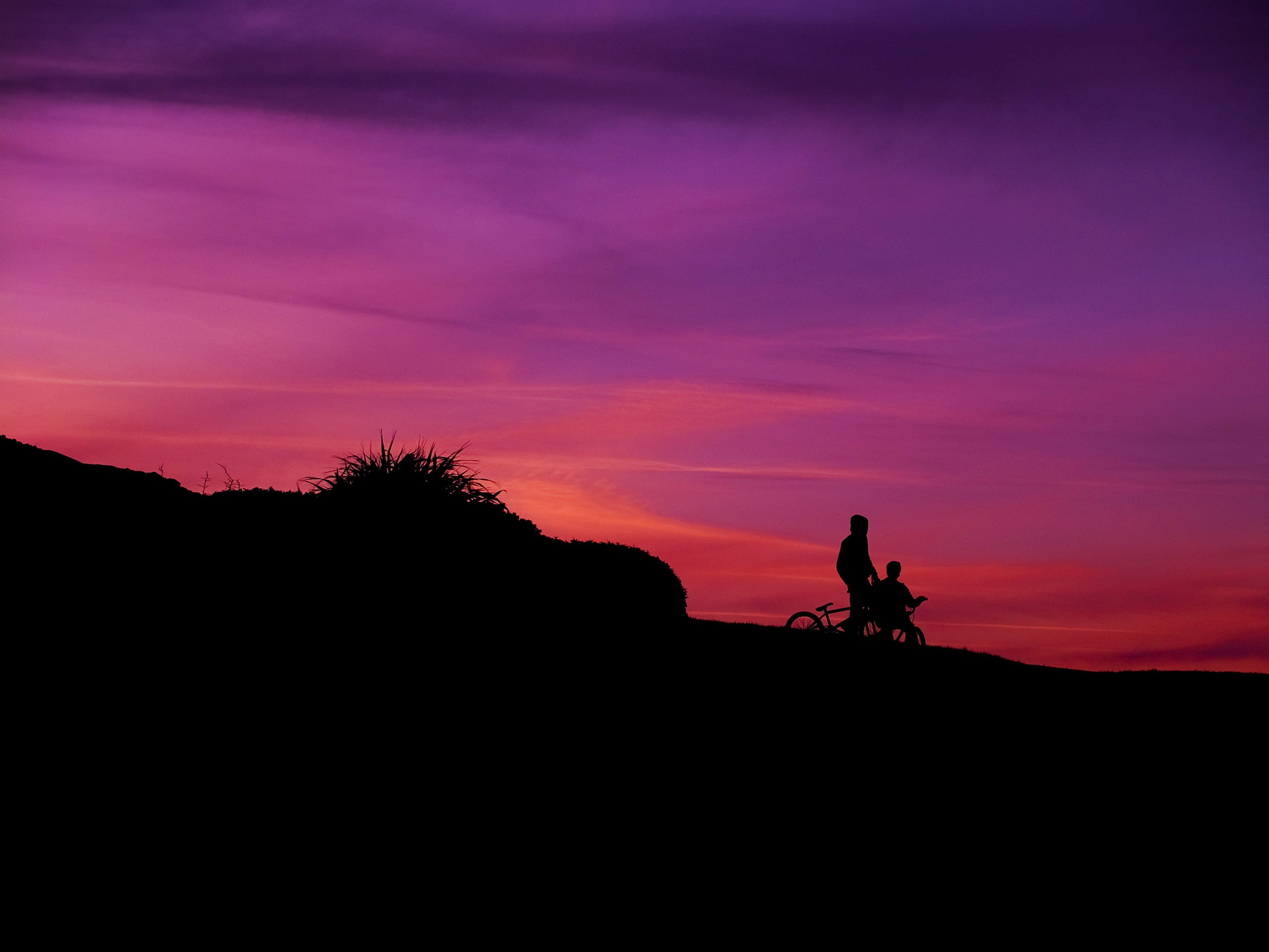 mountain, hour, bicycle, silhouette, dusk, person, sunset, outdoors, leisure, activity, red, real people, golden, purple, leisure activity, nature, tranquility, HD Wallpaper