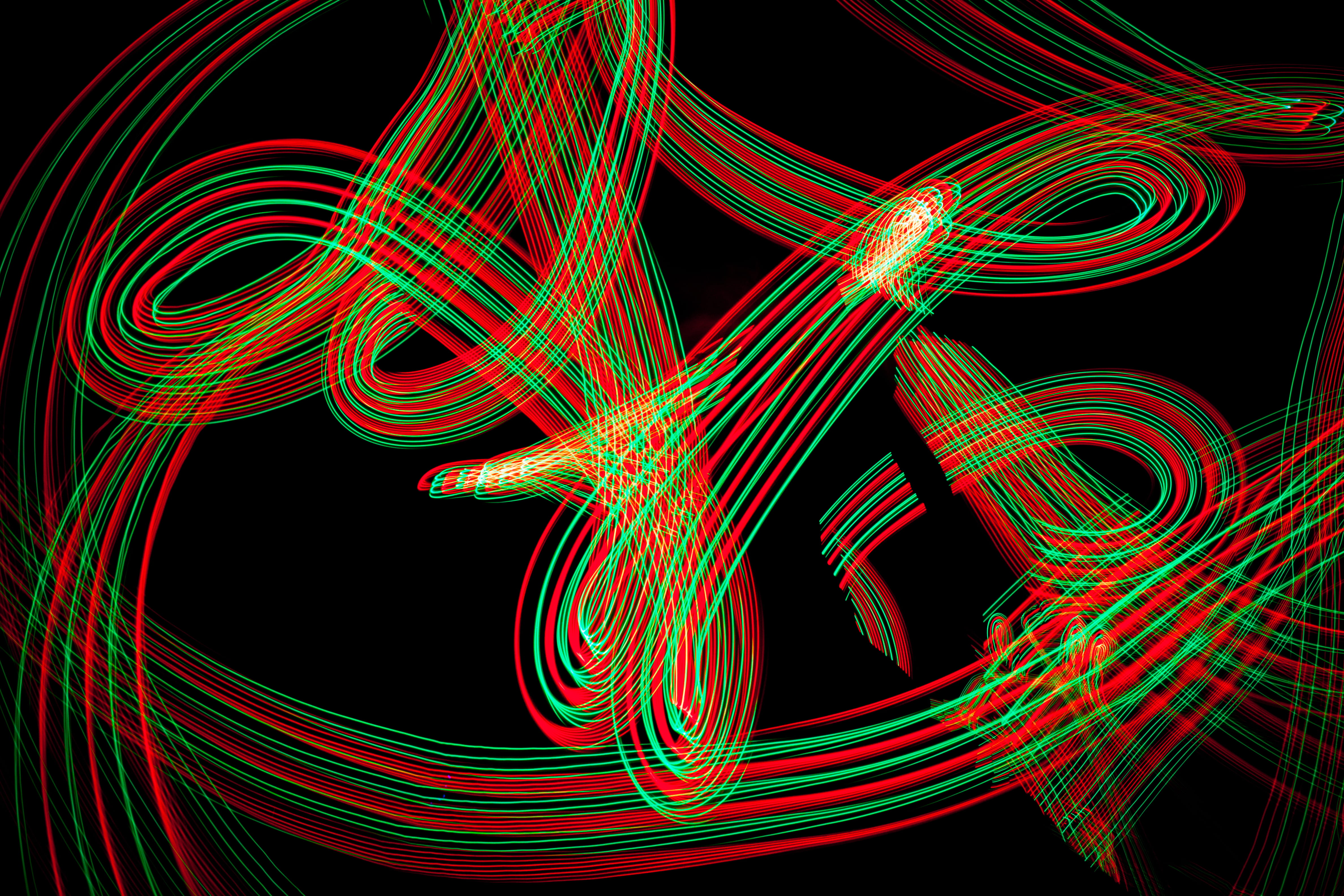 light - natural phenomenon, motion, light trail, red, speed, black, decoration, blurred motion, glowing, time, backgrounds, black background, creativity, HD Wallpaper