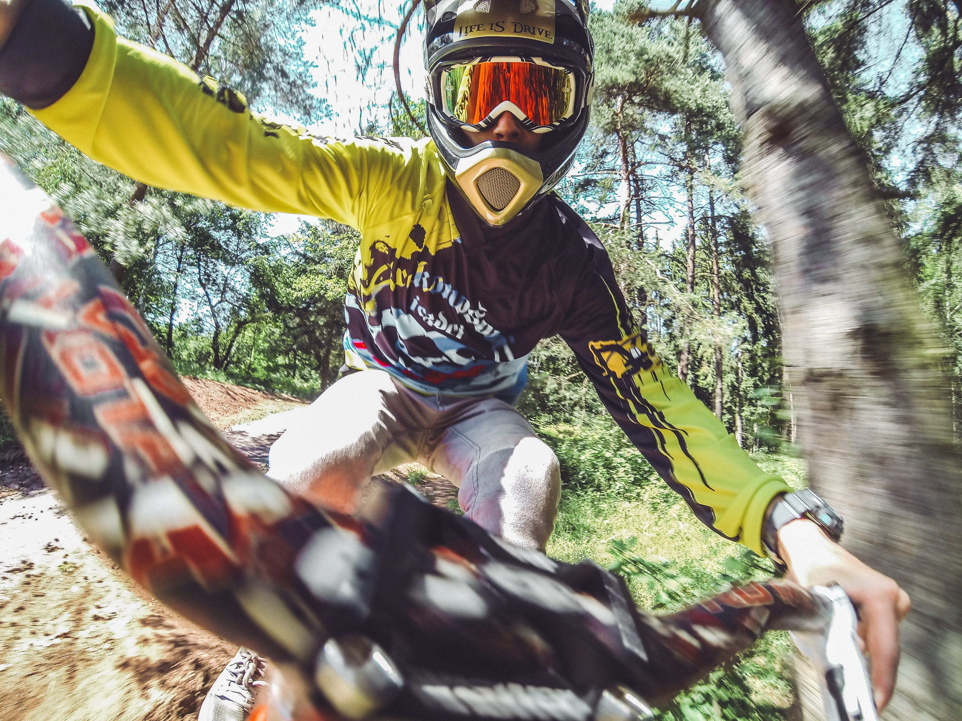 biker, enjoyment, headwear, downhill, sports helmet, men, jump, plant, real people, 4K, selective focus, person, day, mtb, tree, vlčka bike park, leisure activity, HD Wallpaper