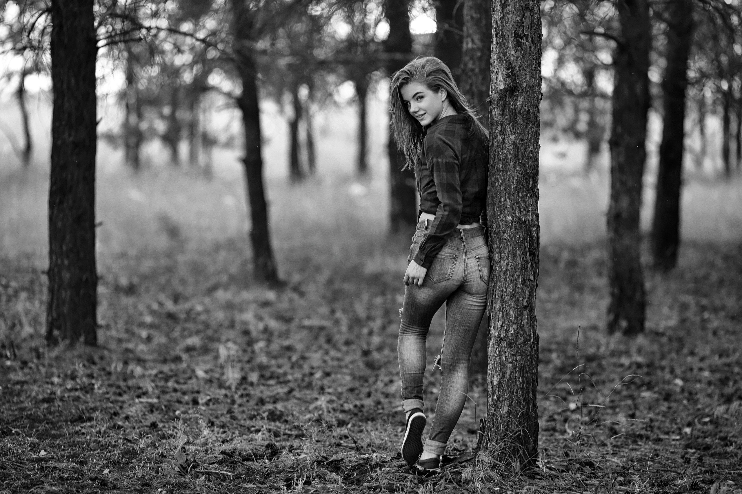 smiling, model, looking at viewer, Murat Kuzhakhmetov, women, women outdoors, long hair, shirt, jeans, trees, 2K, HD Wallpaper