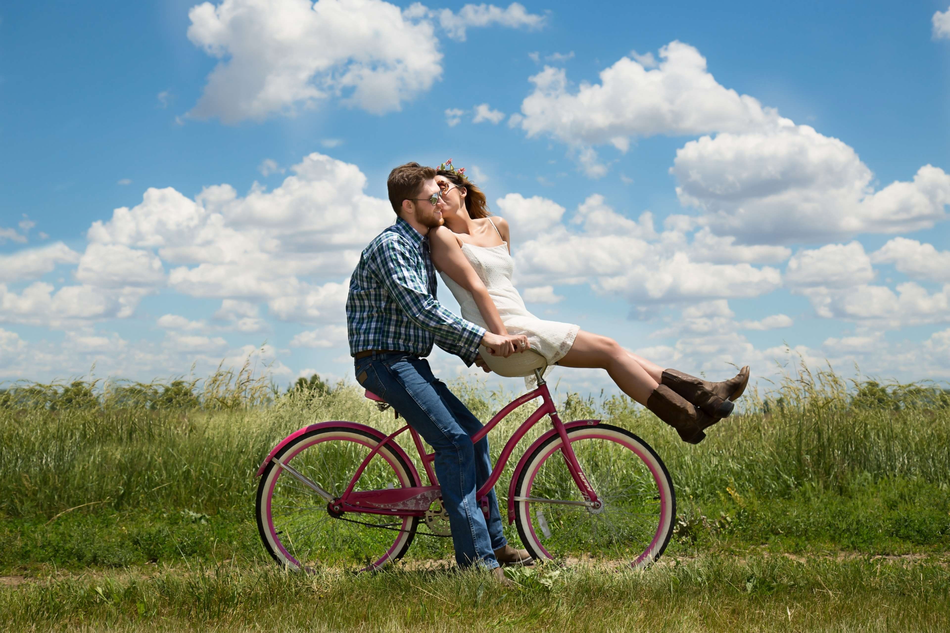 land, real people, happy young couple, emotion, transportation, lifestyles, together, bike, happiness, field, sky, grass, two, two people, couple - relationship, HD Wallpaper