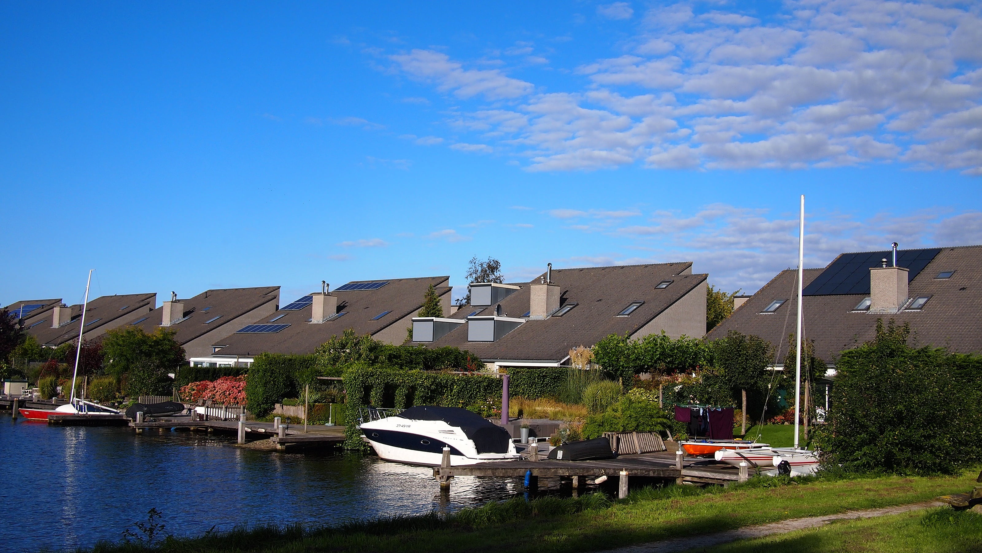 solar panels, street, building exterior, europe, building, built structure, sky, green, nautical vessel, no people, nature, house, city, mode of transportation, HD Wallpaper