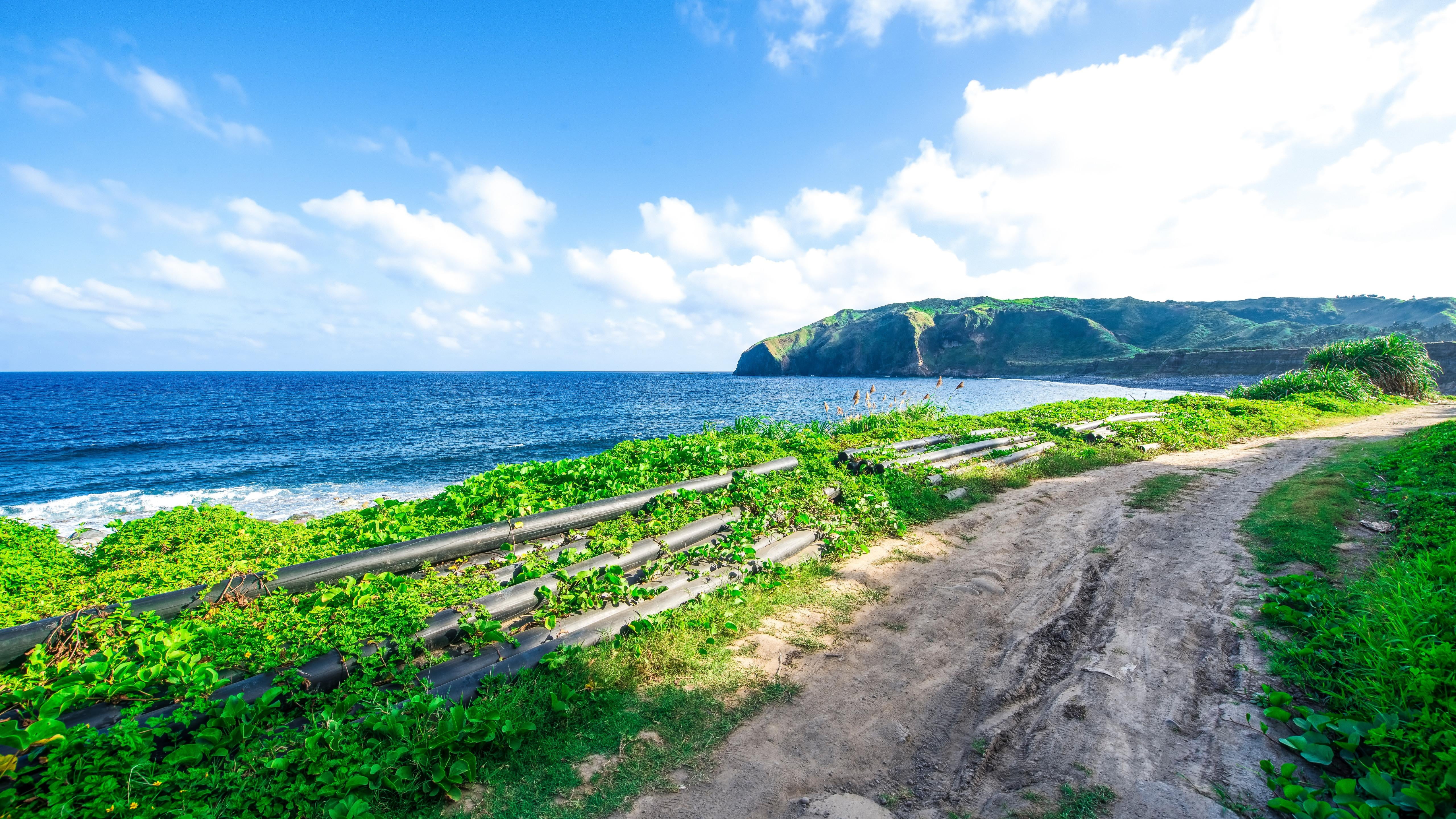 road, green color, nature lover, water, dirt road, path, horizon over water, beauty in nature, tranquility, idyllic, cloud - sky, horizon, nature, batanes, HD Wallpaper