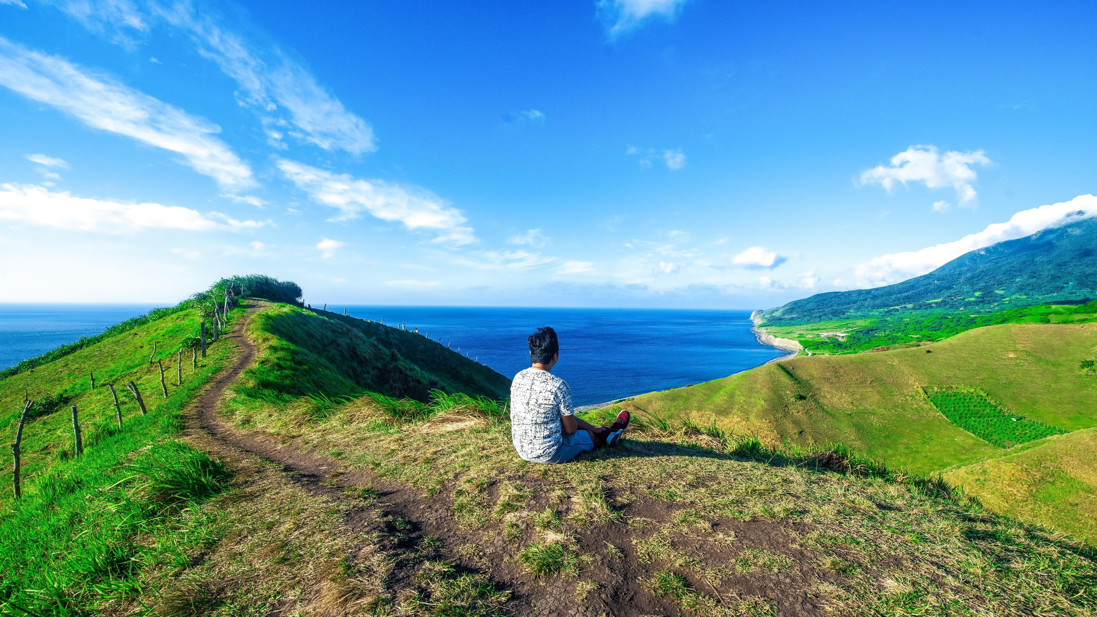 cloud - sky, grass, one person, leisure activity, real people, path, photography, clouds, travel, women, tranquil scene, basco batanes, landscape, 4K, HD Wallpaper