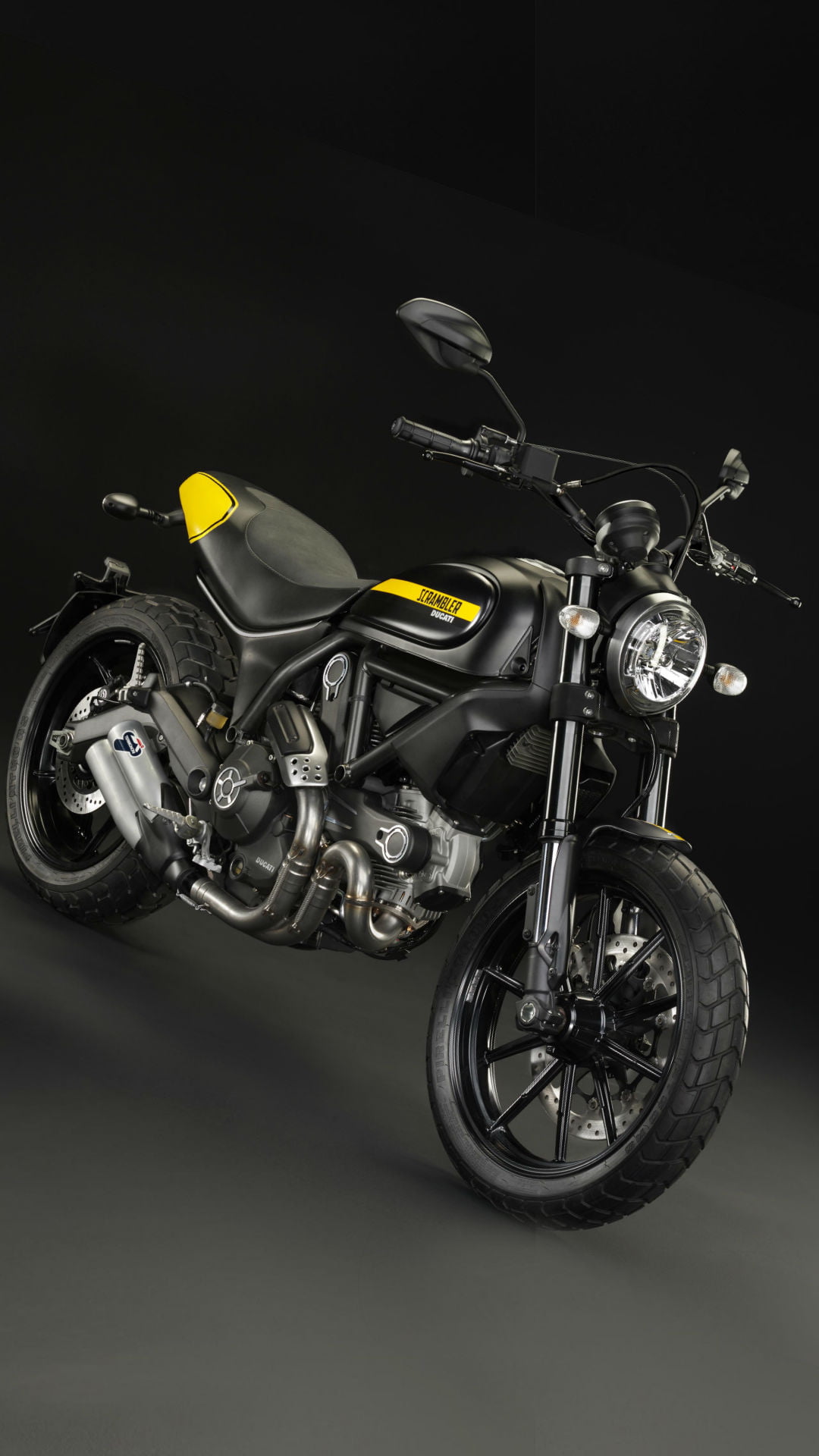 indoors, Ducati, studio shot, scrambler, sport, black, bicycle, sports race, motorcycle, tire, enduro, black color, single object, headwear, Motorcycles, Phone HD Wallpaper
