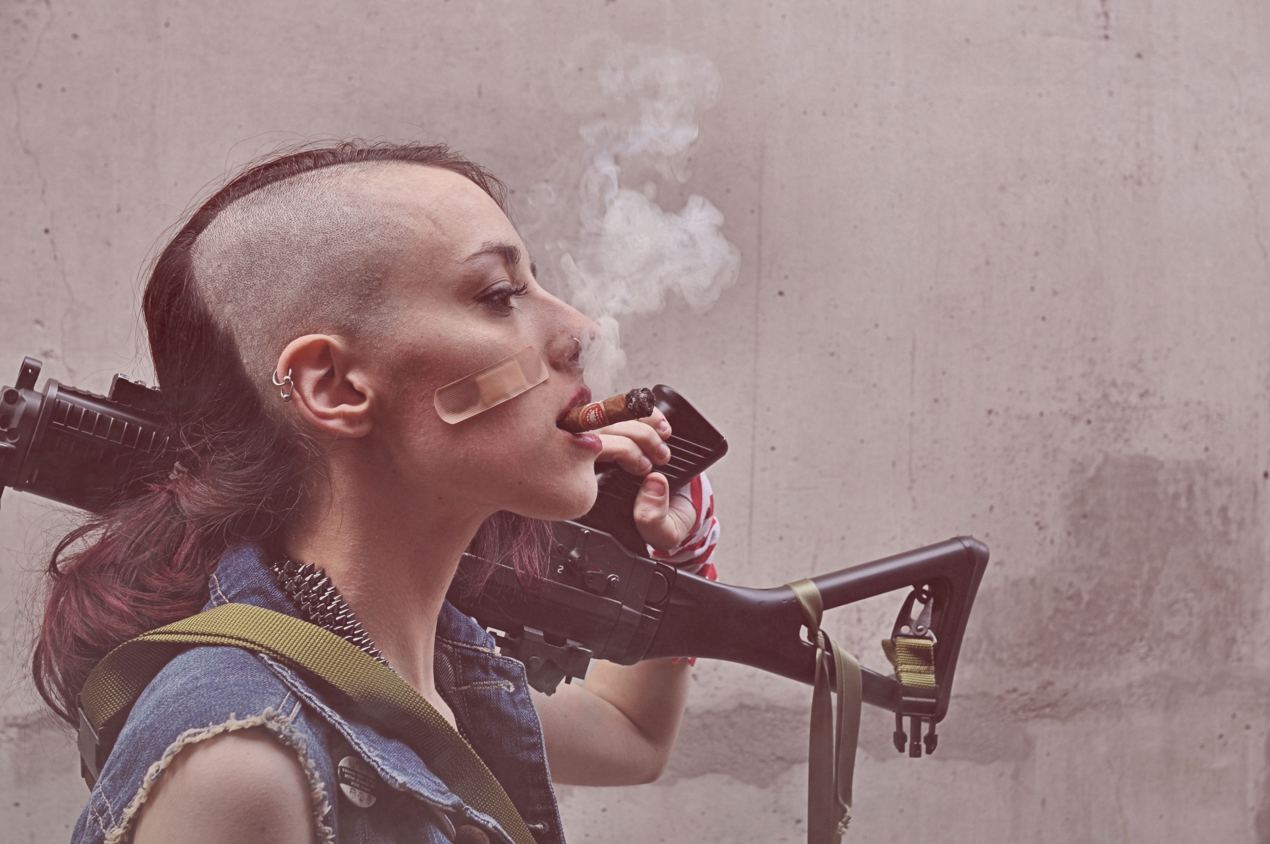 holding, headshot, adult, side view, women, hairstyle, portrait, 4K, wall - building feature, leisure activity, young adult, hair, tank girl cosplay badass danger nose rings gun machine gun, HD Wallpaper