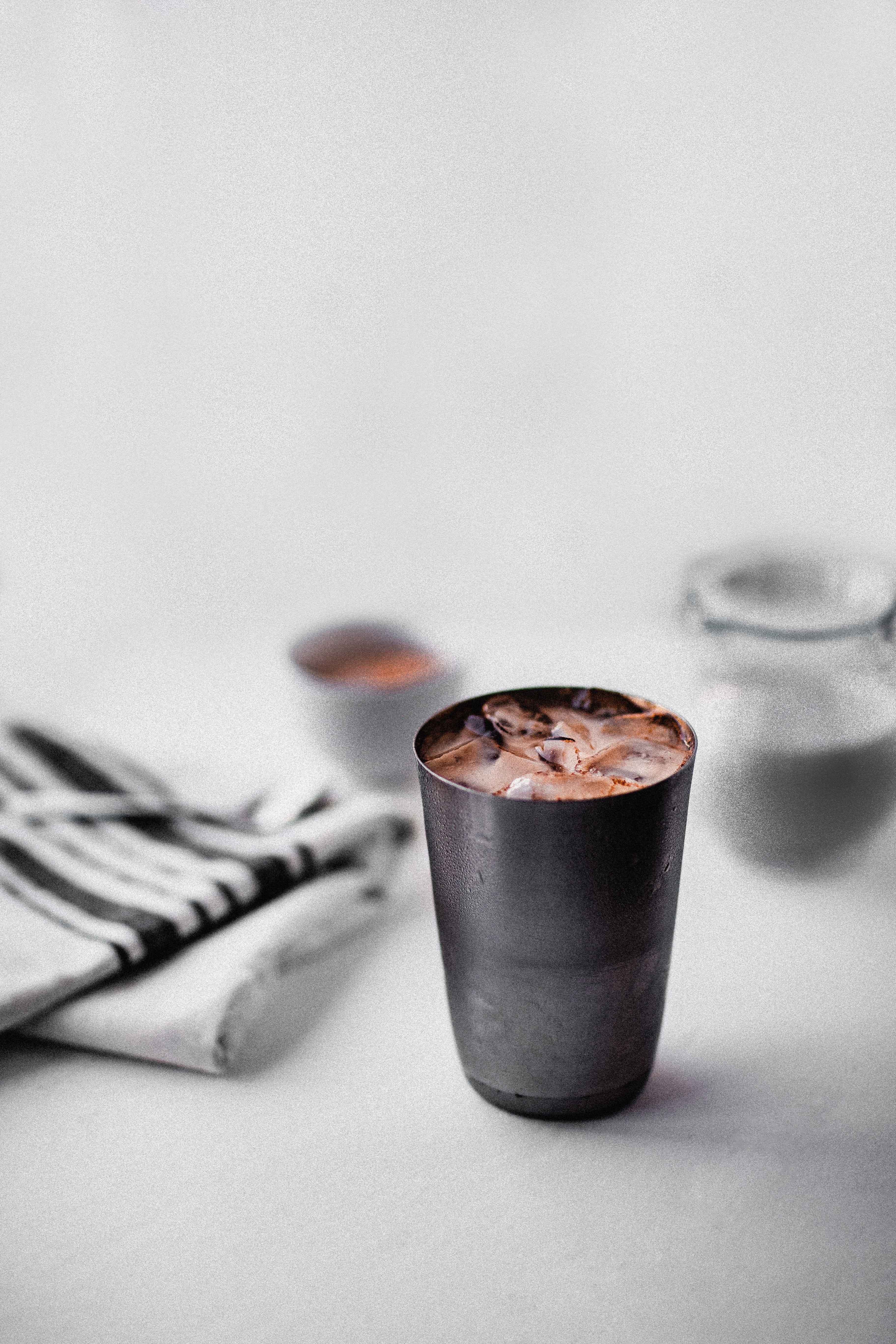 ice, dark, cafe, tone, container, glass, cinnamon, chocolate, black Color, white, heat - Temperature, minimal, steel, mood, grey, brown, towel, table, still life, Phone HD Wallpaper