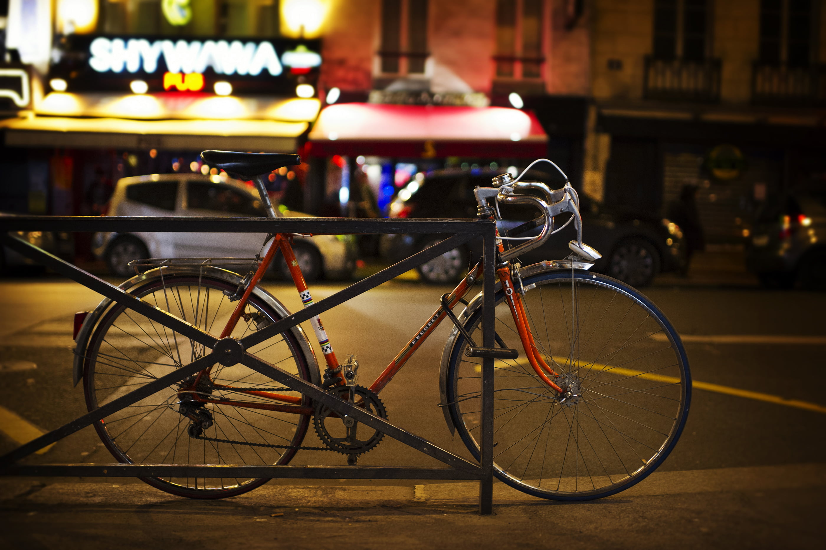 paris, city, bokeh, street, defocused, bike, dustin, road bicycle, peugeot, transportation, night, orange, red  road, bicycle, urban Scene, road, paris  france, HD Wallpaper