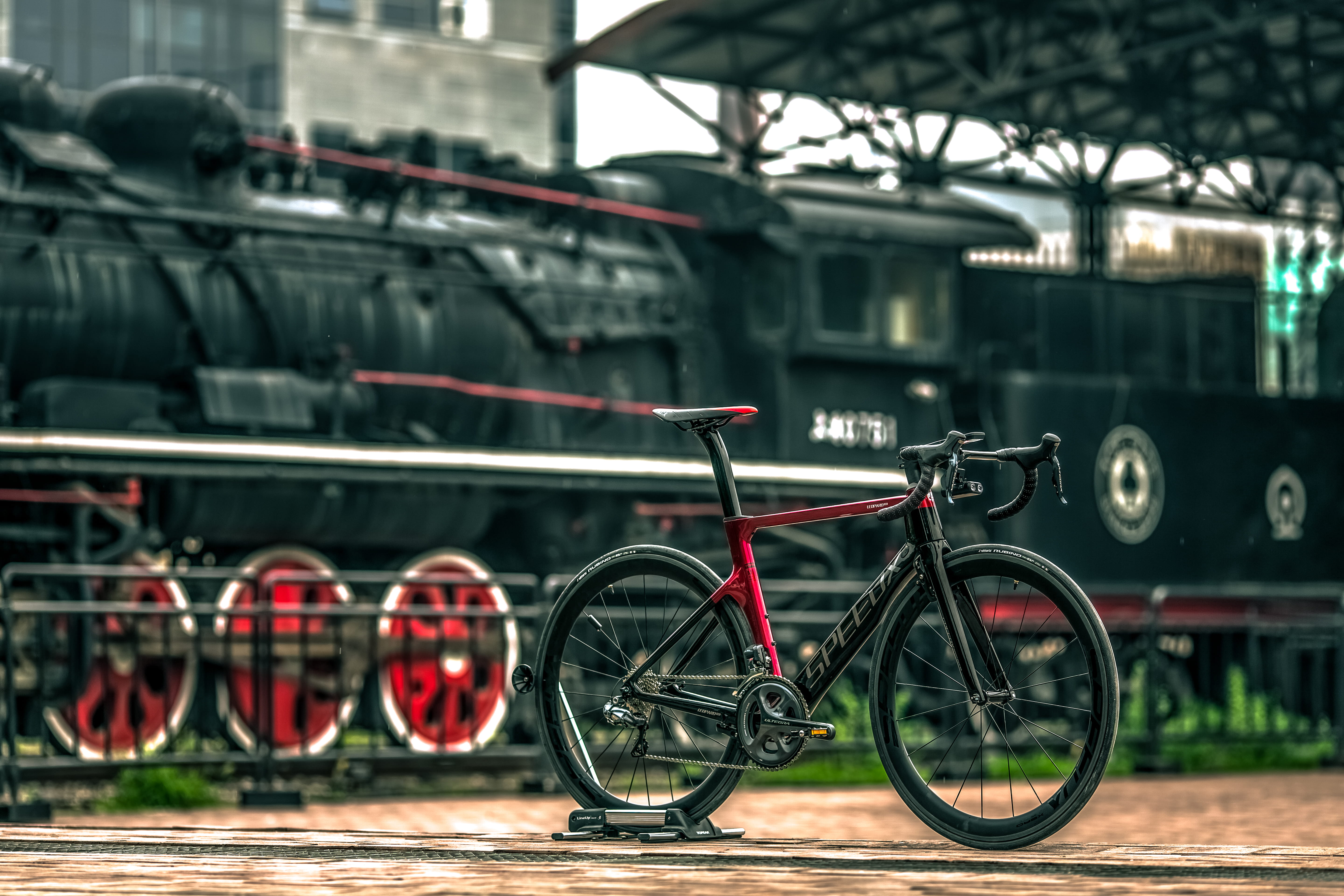 no people, built structure, street, red, wheel, city, building exterior, cycling, black, bike, architecture, travel, land vehicle, 5K, stationary, train, HD Wallpaper
