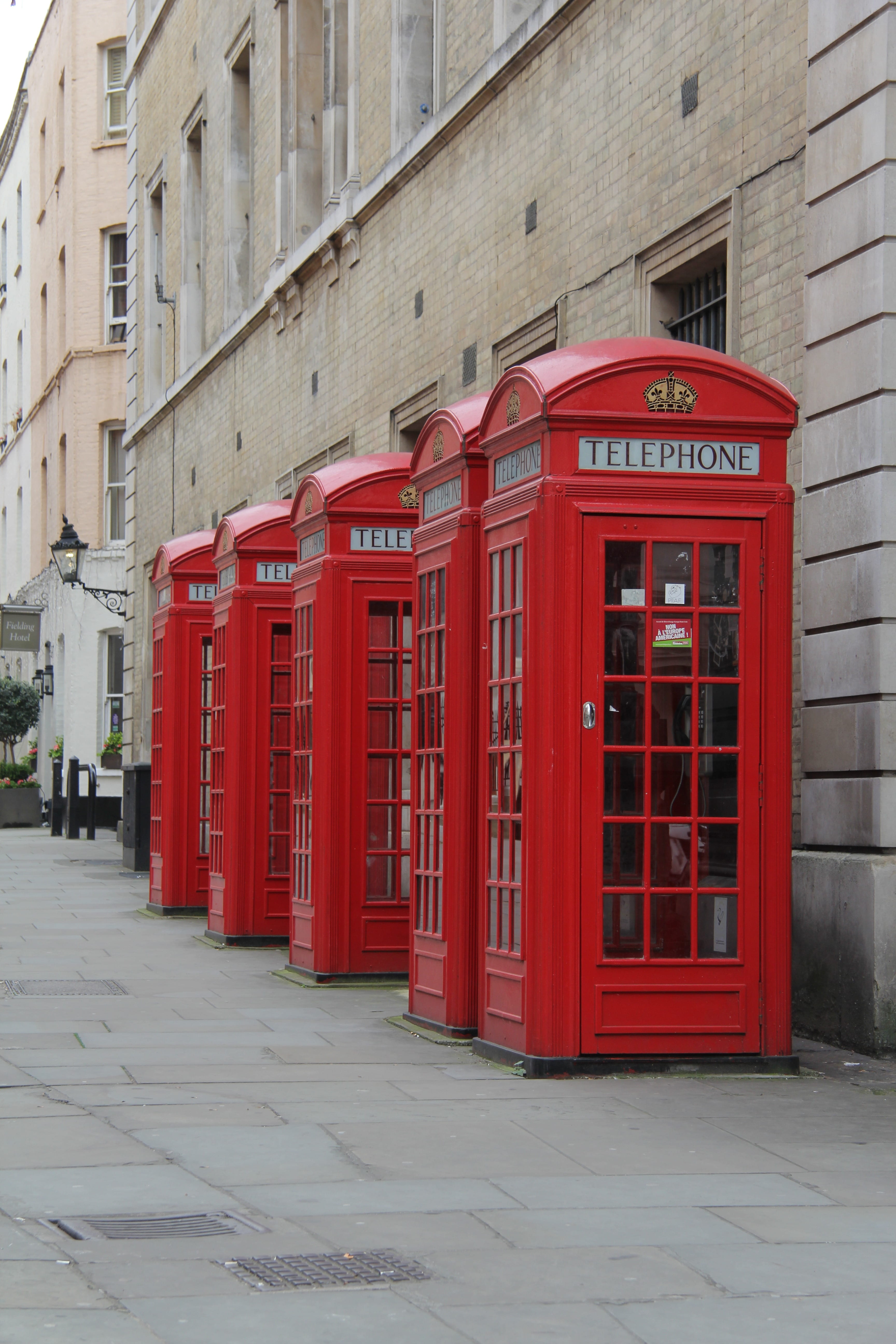 telephone, built structure, text, booths, 5K, red phone box, sidewalk, convenience, several, telephone booth, communication, footpath, building, england, Phone HD Wallpaper