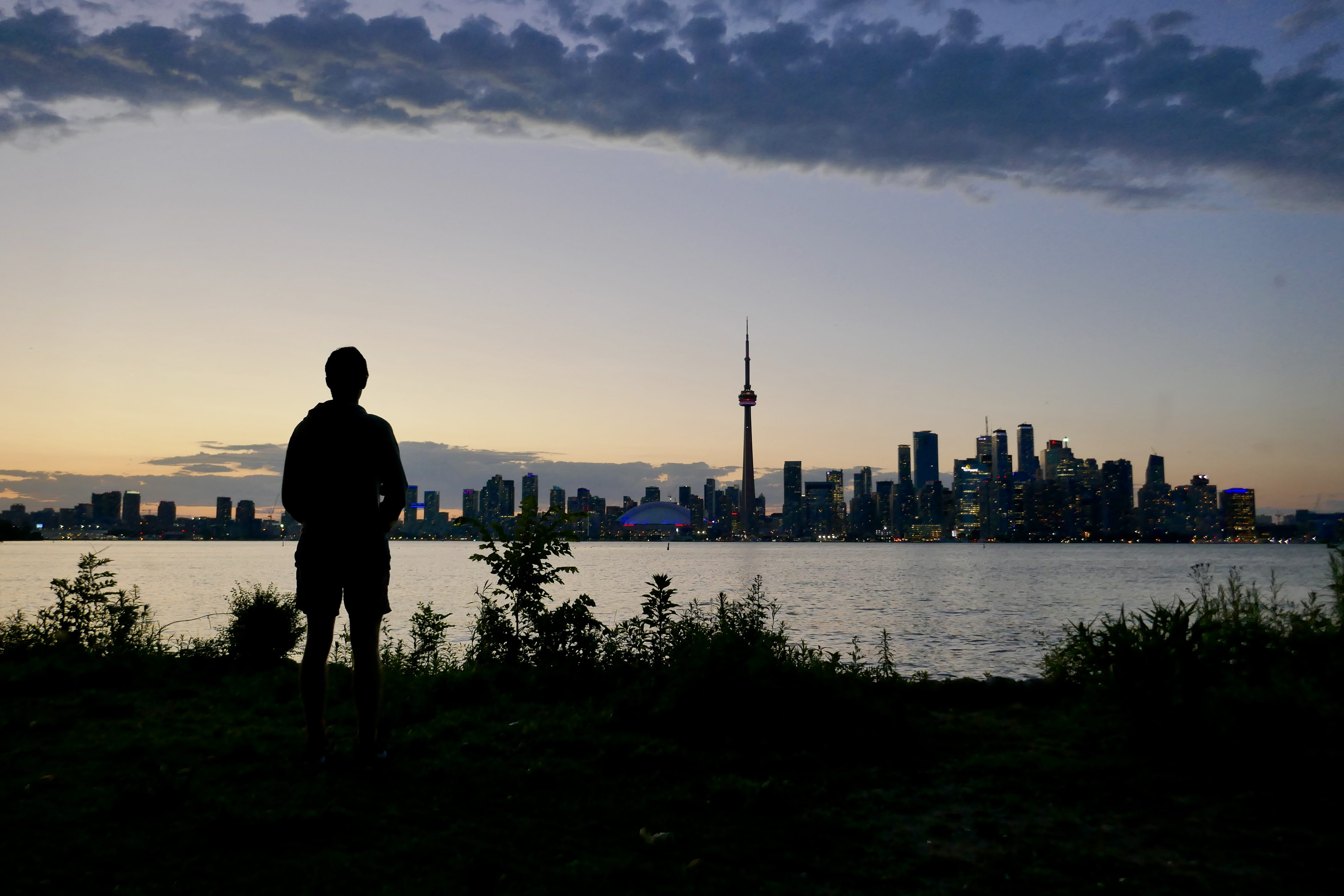 landscape, standing, sky, building, sea, cityscape, building exterior, sports, fitness, office building exterior, looking at view, canada, skyscraper, real people, HD Wallpaper
