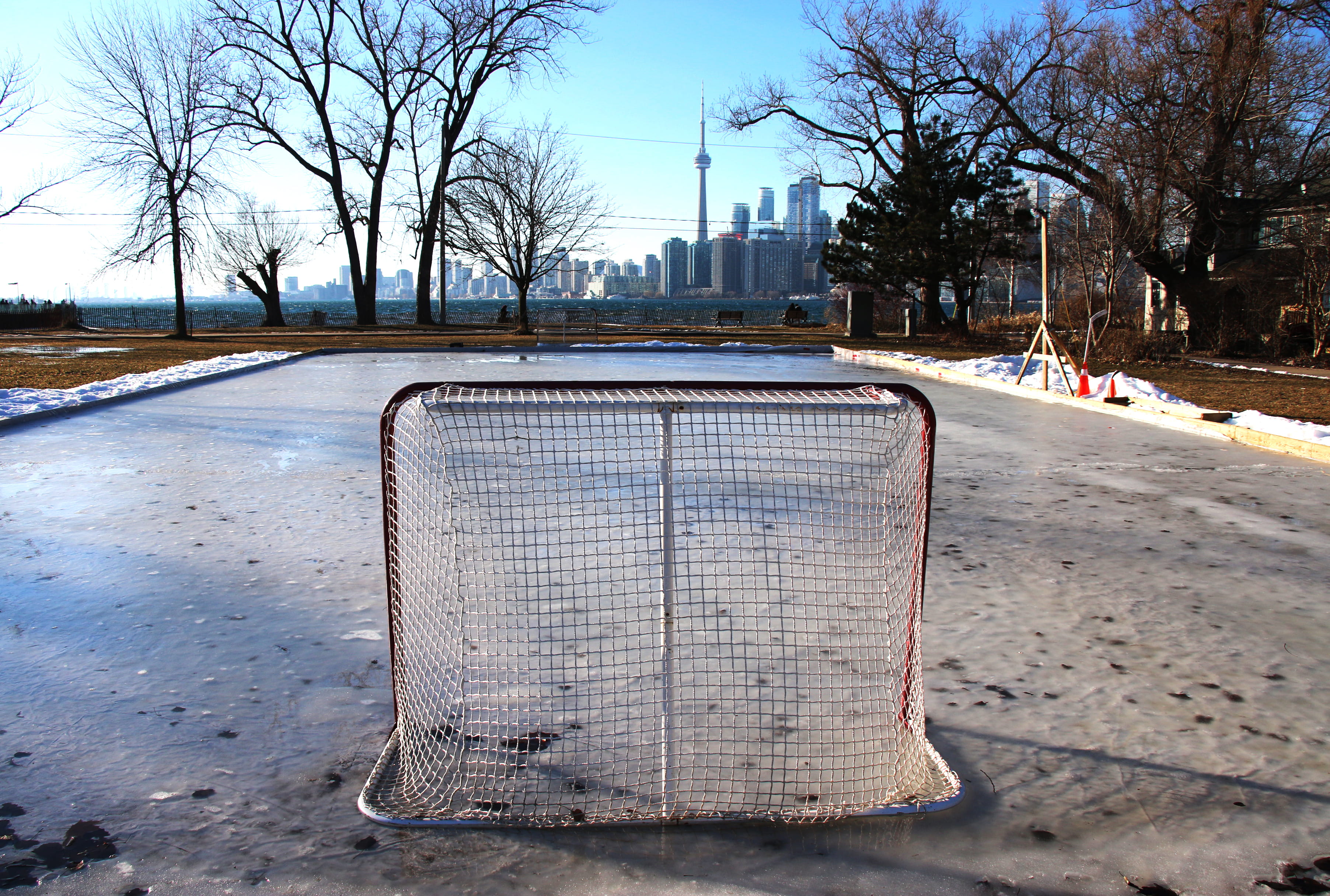 day, building exterior, cn tower, city, road, barrier, puck, sport, island, bare tree, tree, plant, sky, landscape, outdoors, building, toronto, nature, HD Wallpaper