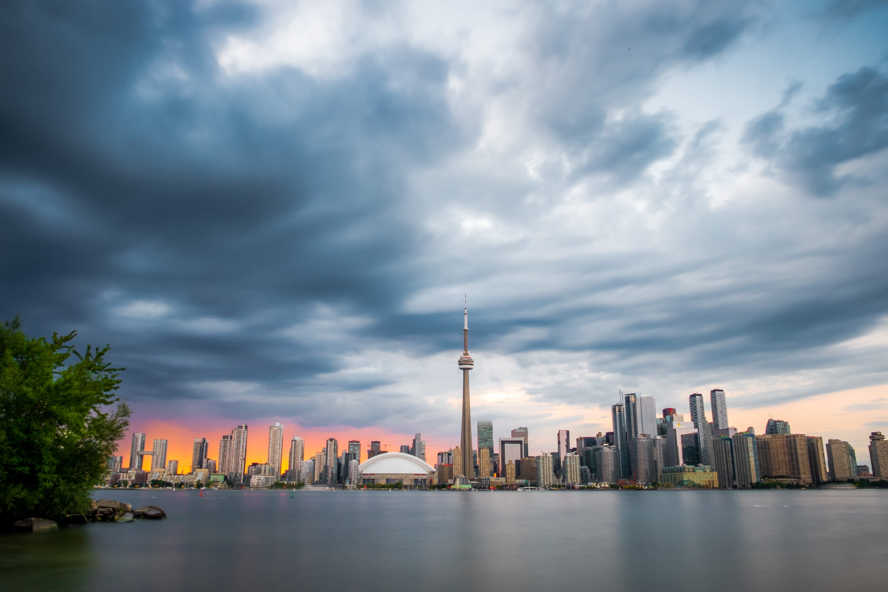 tree, cloud - sky, town, no people, space, building, downtown, urban, urban skyline, ocean, 2K, cloud, spire, centre island, tall - high, financial district, HD Wallpaper