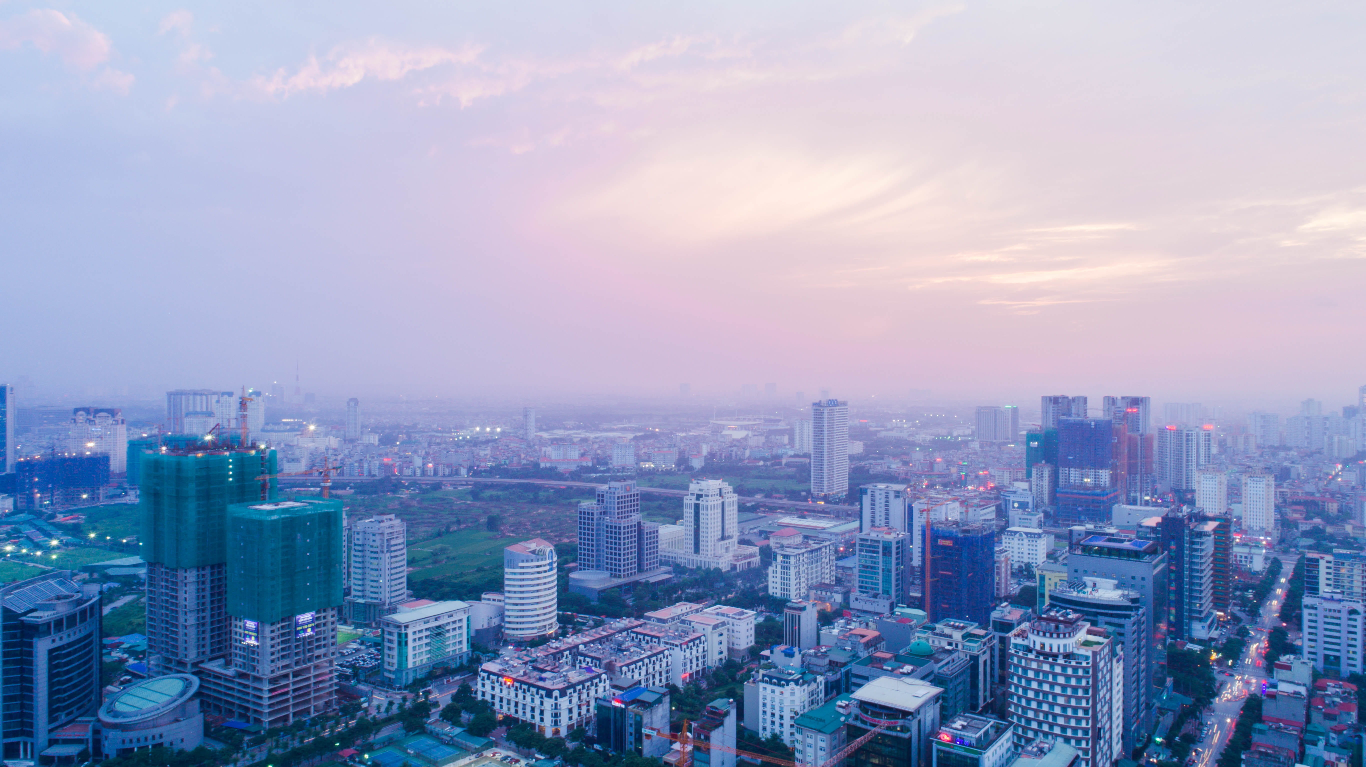 skyscraper, 5K, crowd, landscape, tower blocks, nature, office building exterior, urban skyline, high angle view, modern, building exterior, pink sky, HD Wallpaper