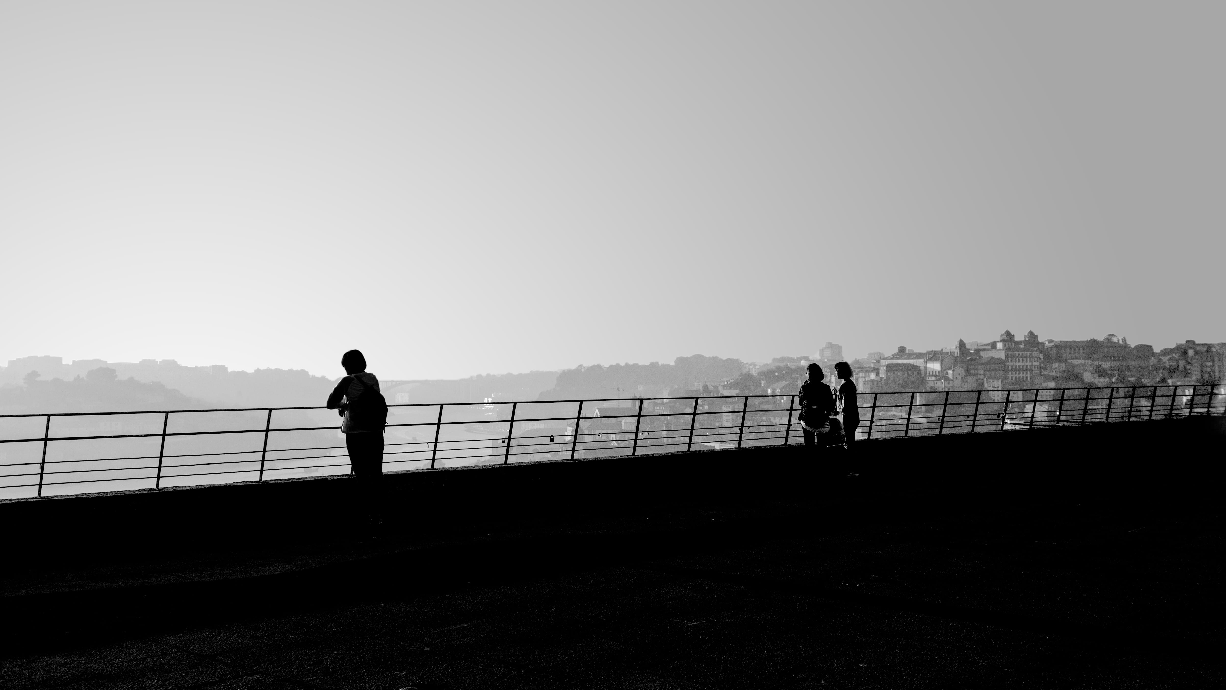 lifestyles, real people, outdoors, full length, leisure activity, clear sky, people, built structure, connection, standing, silhouette, railing, shadows, HD Wallpaper