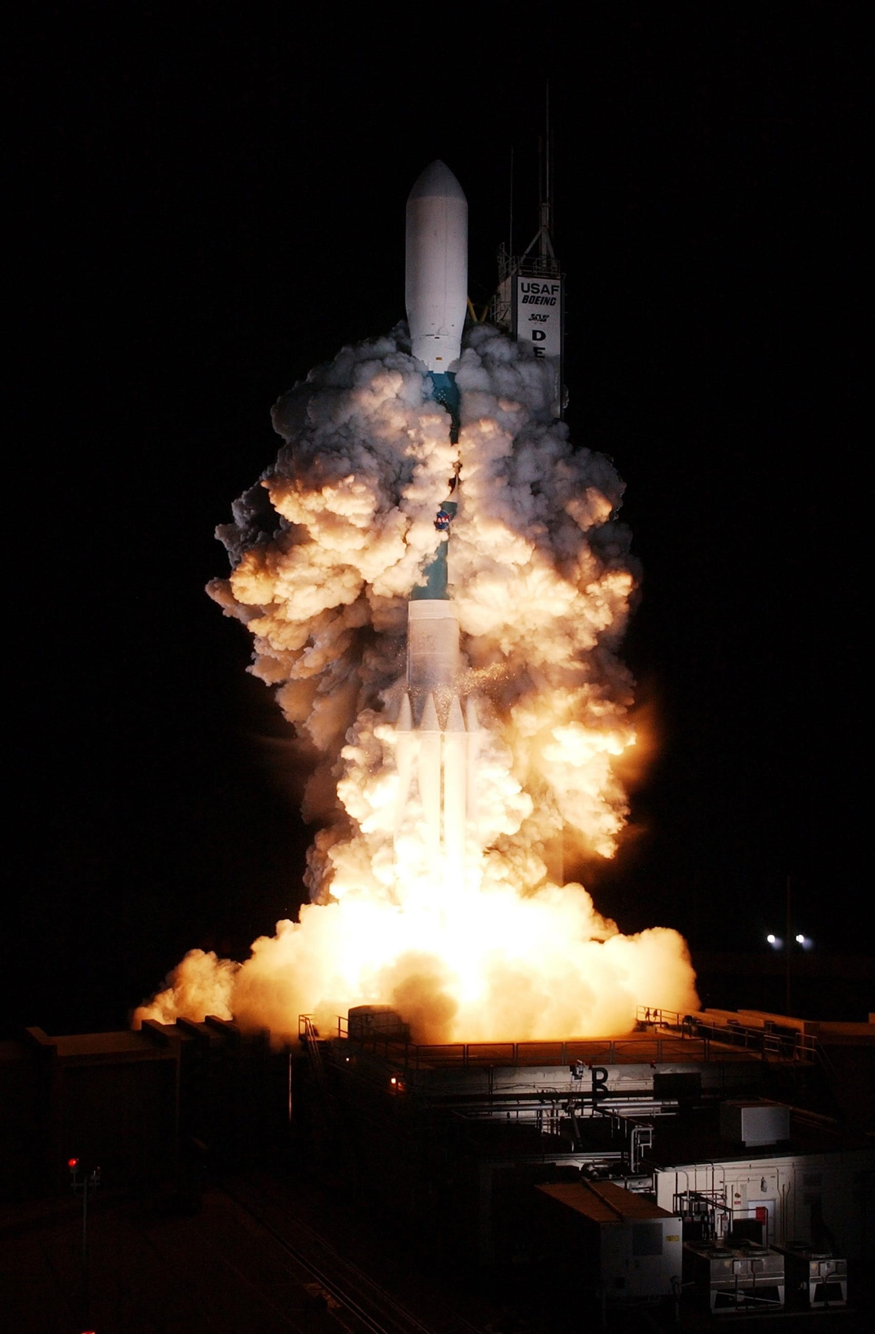 industry, motion, air vehicle, science, no people, white, outdoors, night, fire, space travel vehicle, launch pad, building exterior, smoke - physical structure, Phone HD Wallpaper