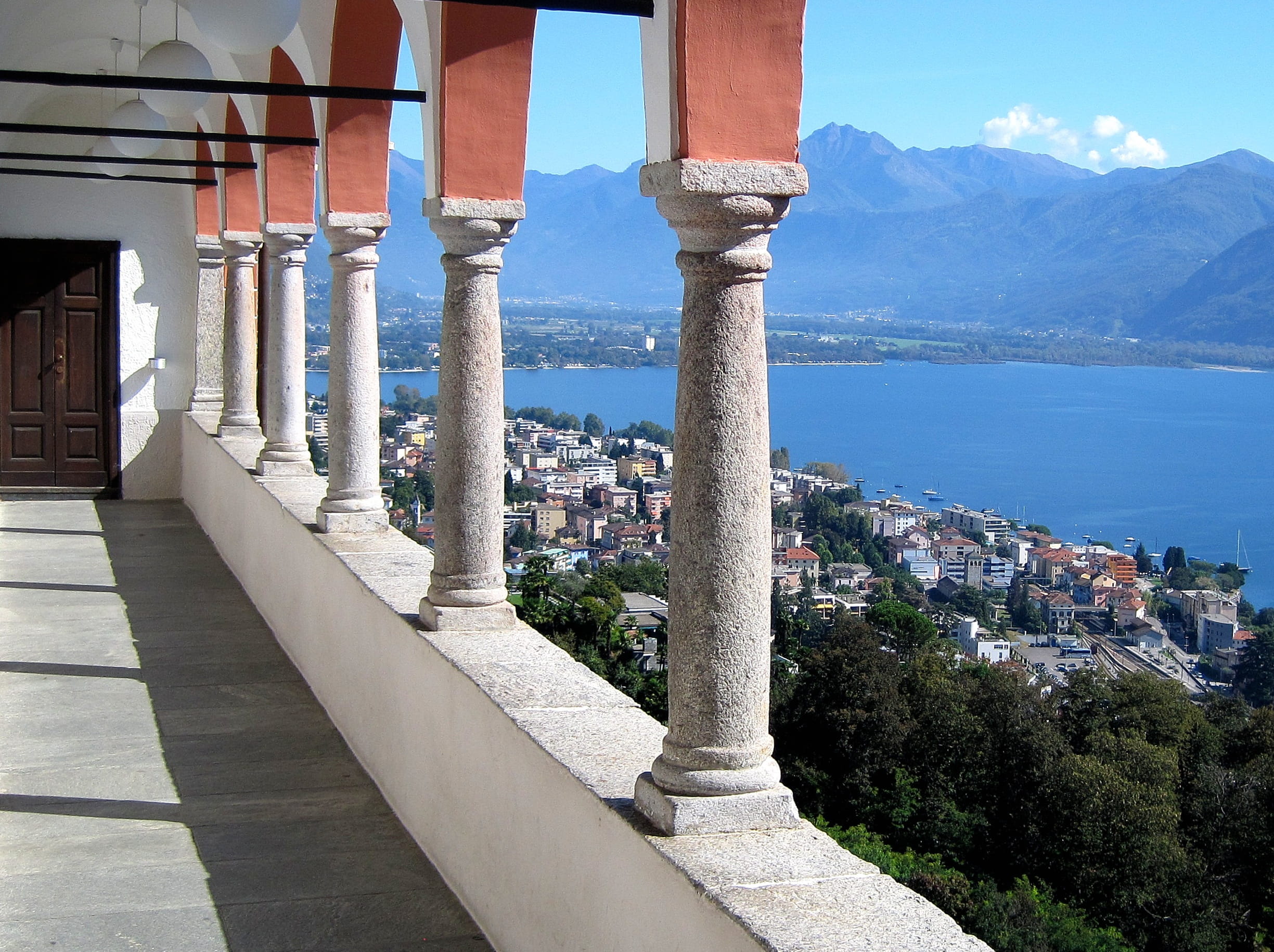 sea, Ticino, travel Locations, mountain, city, sky, building exterior, sunlight, residential district, tree, balustrade, cityscape, day, mountains, architecture, HD Wallpaper