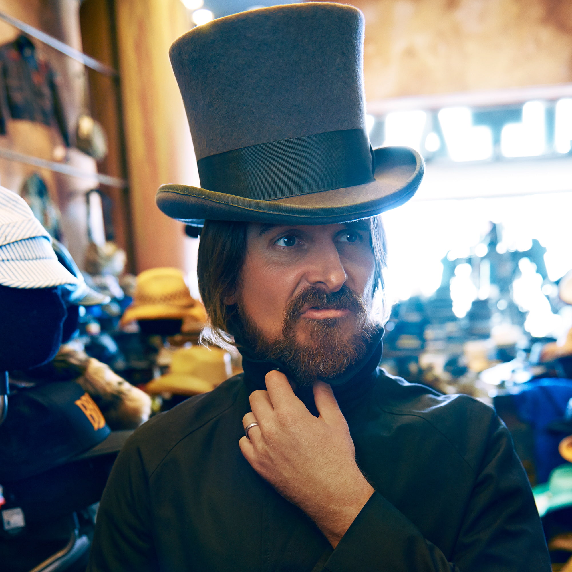 beard, closeup, bokeh, Esquire, humor, Christian Bale, face, hat, grimace, photographer, Peggy Sirota, 1080P, Phone HD Wallpaper