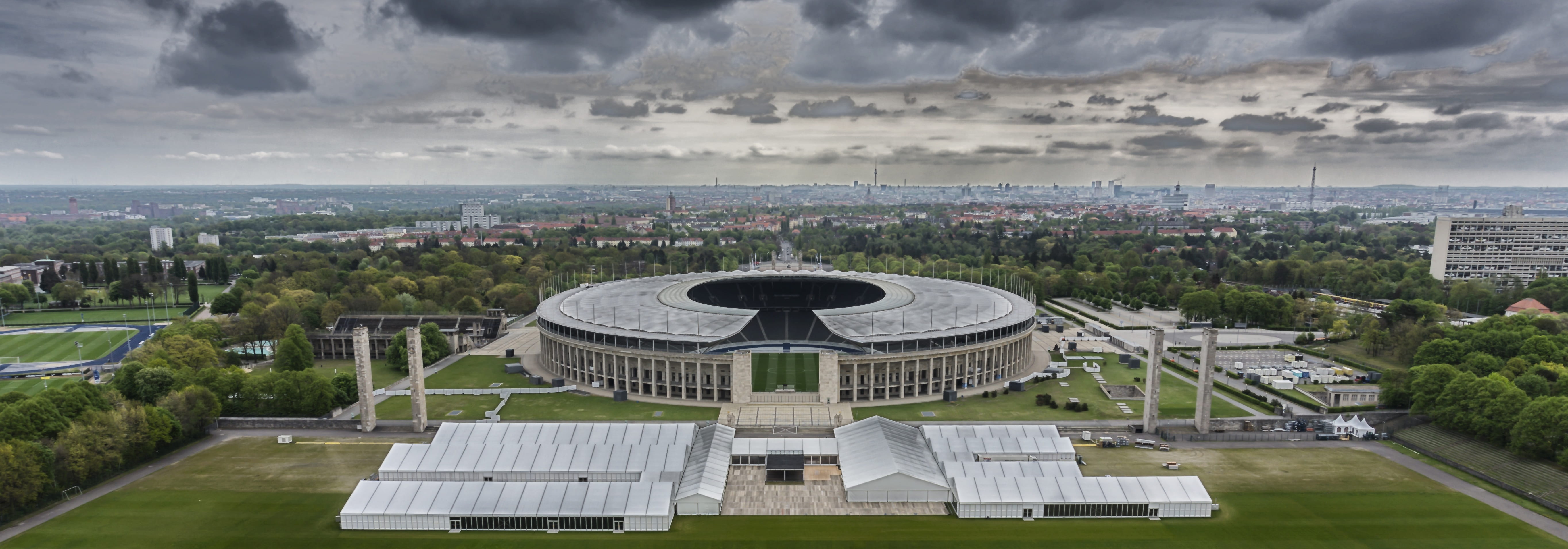 nature, high angle view, urban skyline, 5K, berlin olympic stadium, environment, built structure, city, cloud - sky, cityscape, sky, day, plant, grass, HD Wallpaper