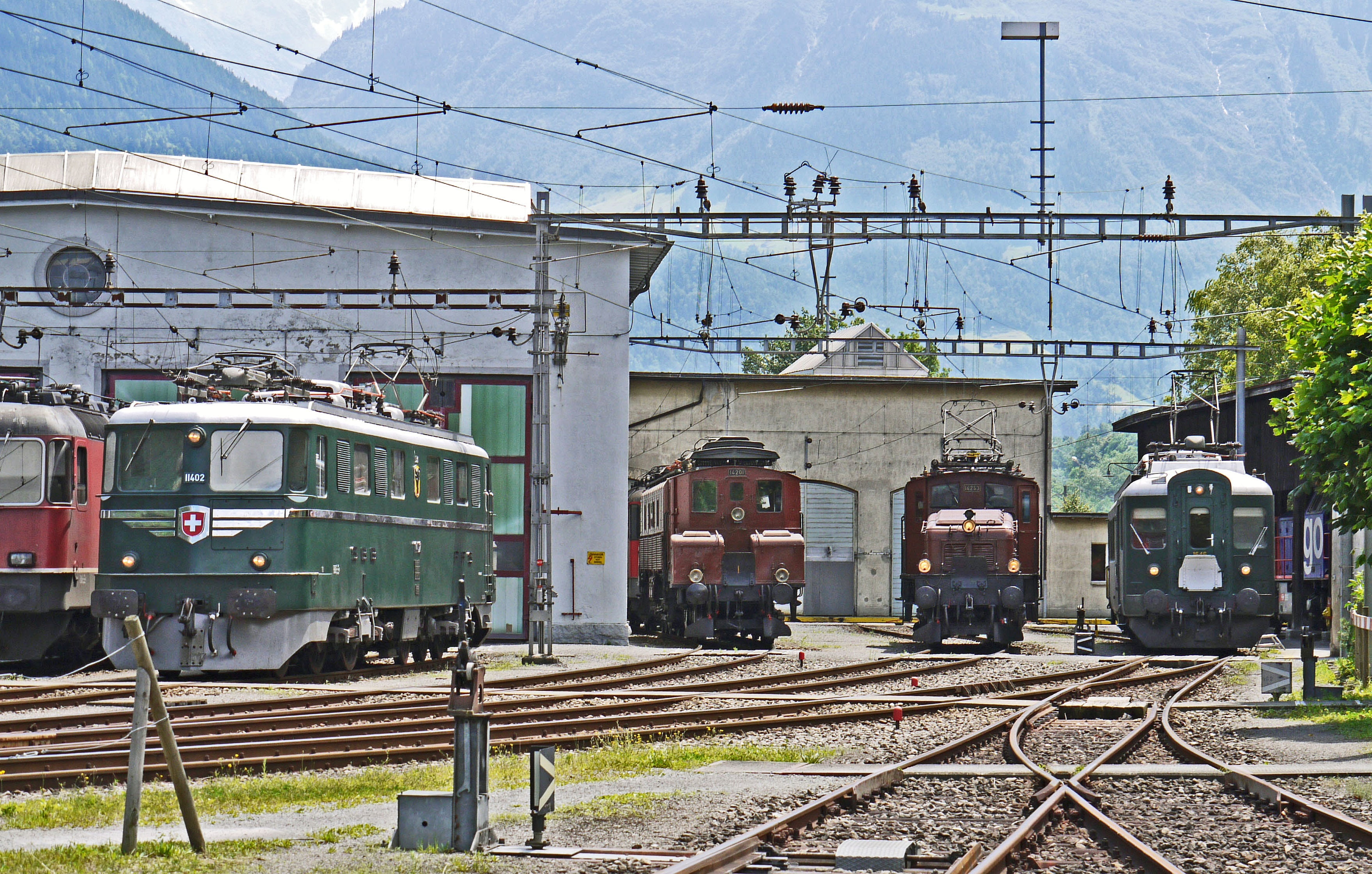 depot of erstfeld, trains, mountains, alpine, built structure, uri, presentation, central switzerland, mode of transportation, locomotive shed, public transportation, HD Wallpaper