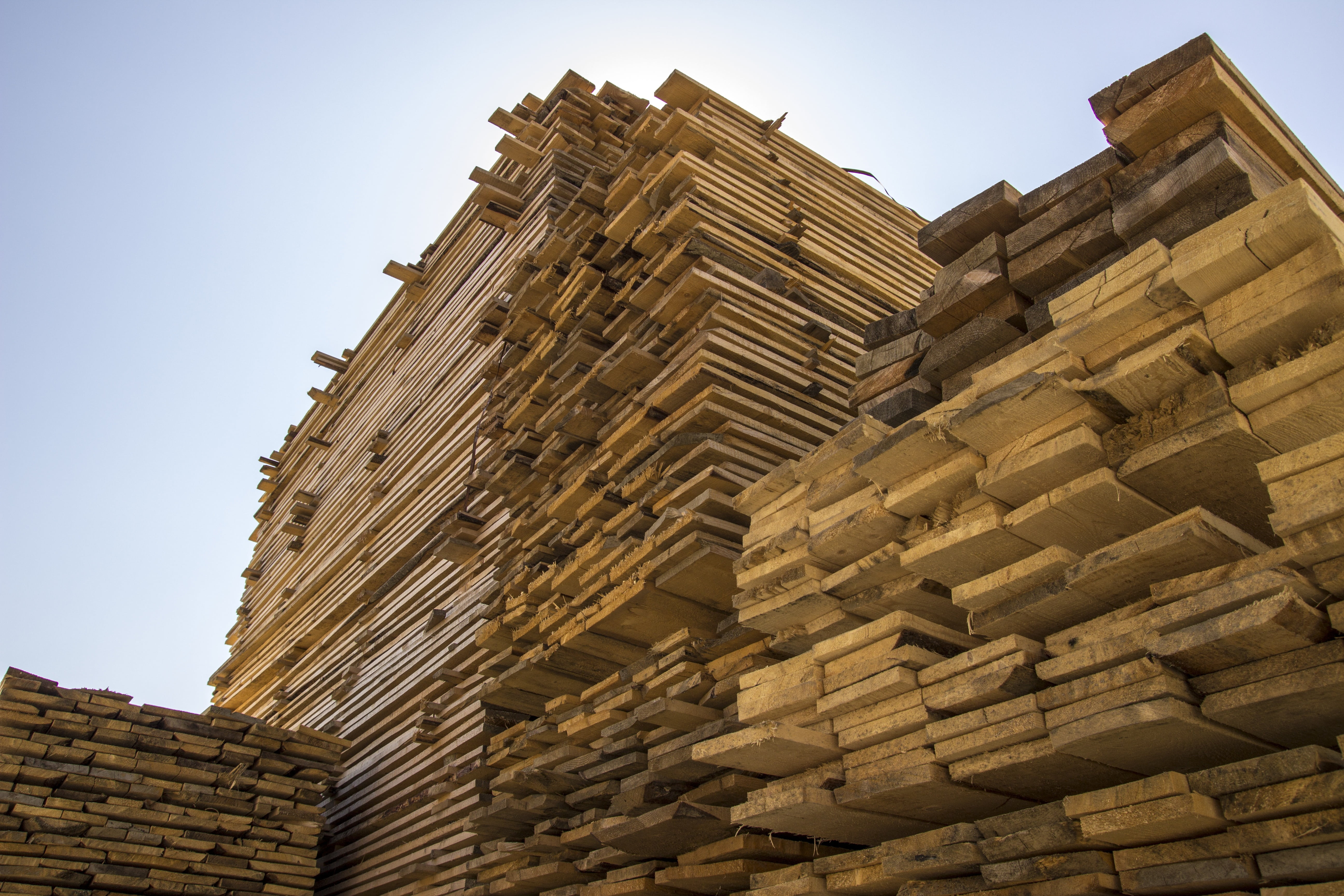 industry, carpentry, history, brown, building exterior, wood, wooden planks, place of worship, construction, archaeology, stacked wood, sky, no people, HD Wallpaper