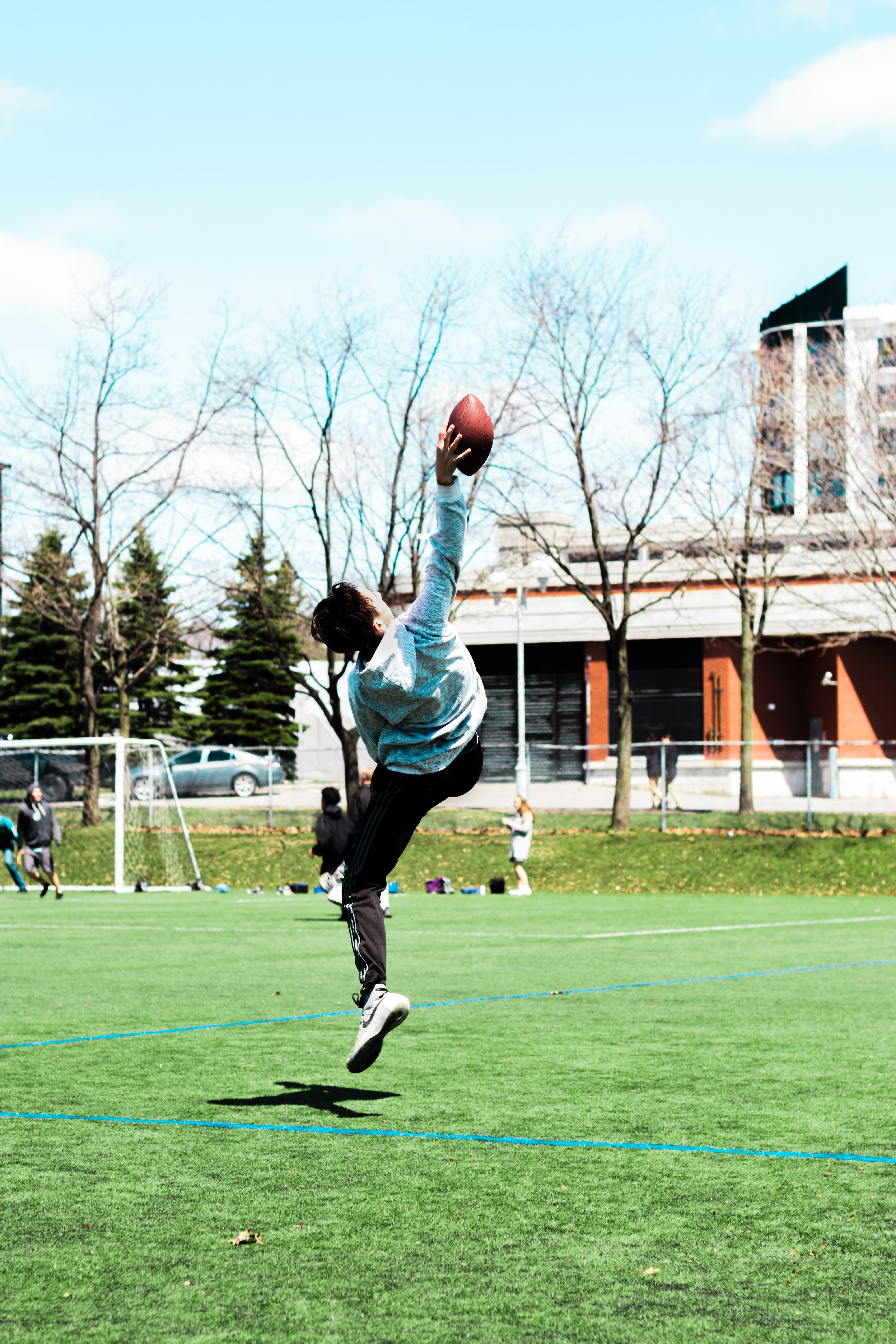 day, human, playing, grass, ball, child, soccer field, field, full length, real people, person, plant, vehicle, nature, team, motion, exterior, leisure activity, Phone HD Wallpaper