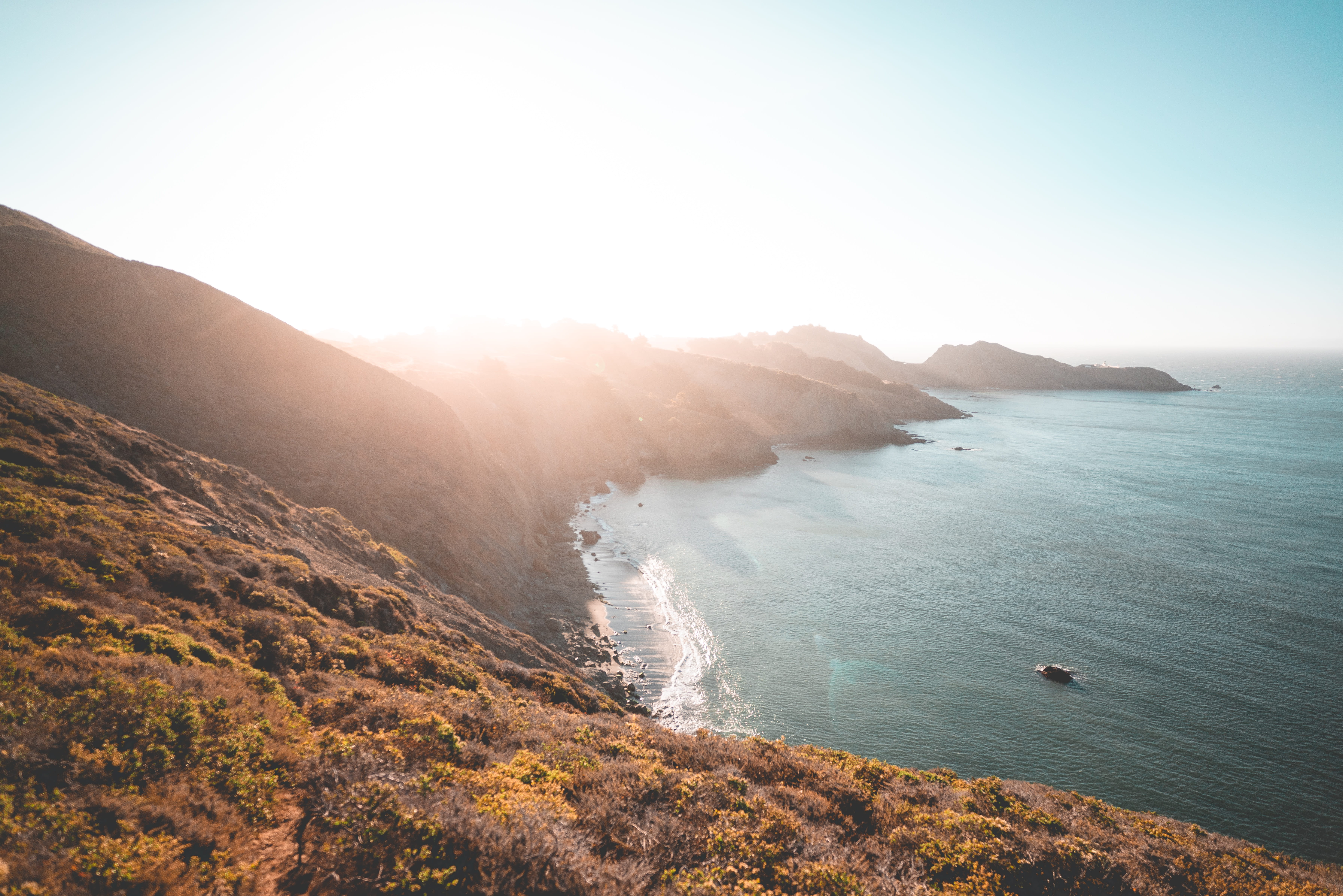 water, outdoors, no people, day, sunlight, tranquil scene, mountain, sky, 5K, beauty in nature, high angle view, sea, tranquility, rippling, clear sky, HD Wallpaper