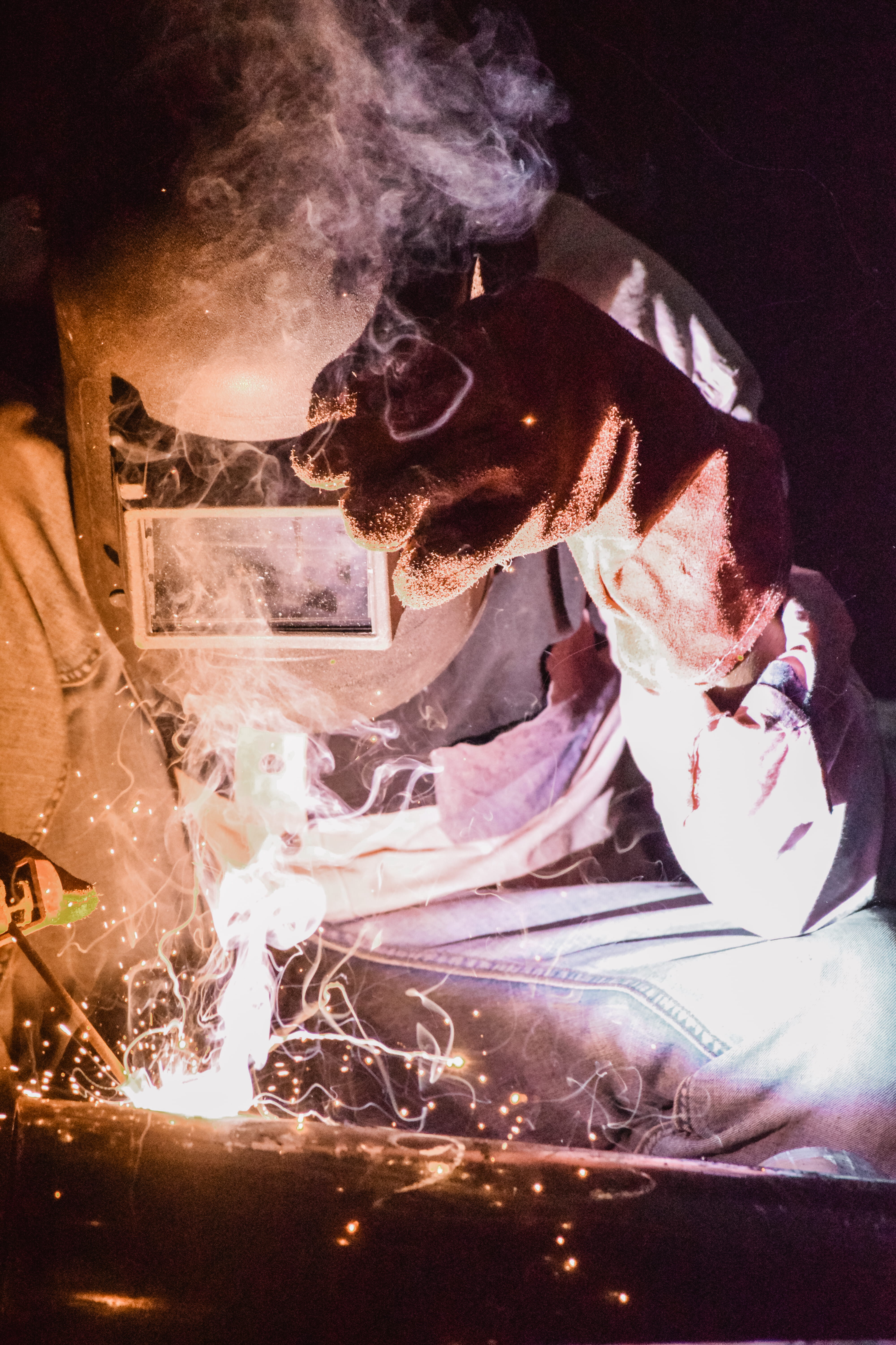 close-up, smoke, working, welding, 5K, glove, motion, person, mask, smoke - physical structure, heat, spark, job, profession, heat - temperature, men, Phone HD Wallpaper