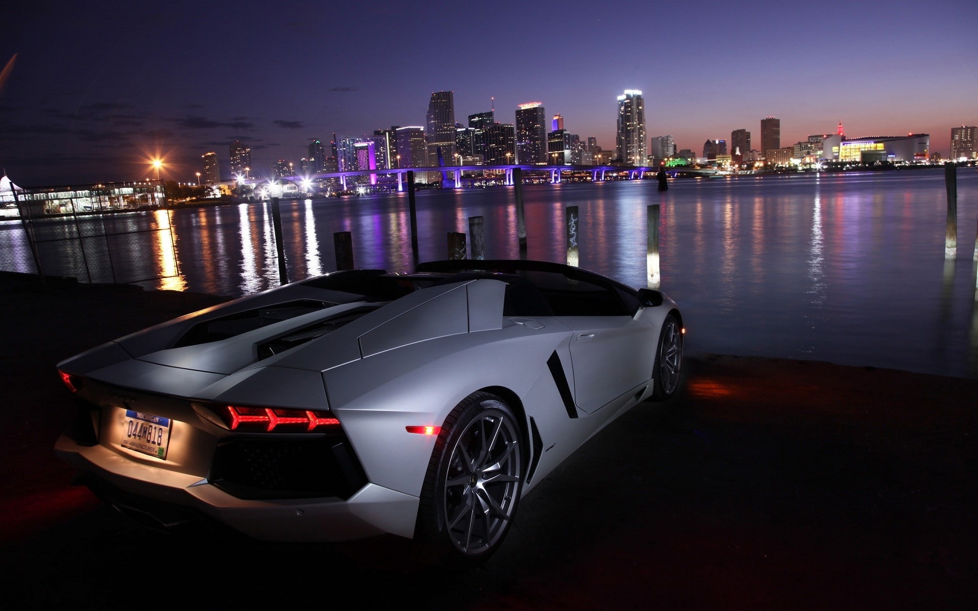 luxury, skyscraper, nightlife, transportation, modern, landscape, illuminated, architecture, night, urban skyline, car, city life, 1080P, no people, lamborghini lamborghini aventador lp700 4 roadster lamborghini aventador miami, HD Wallpaper