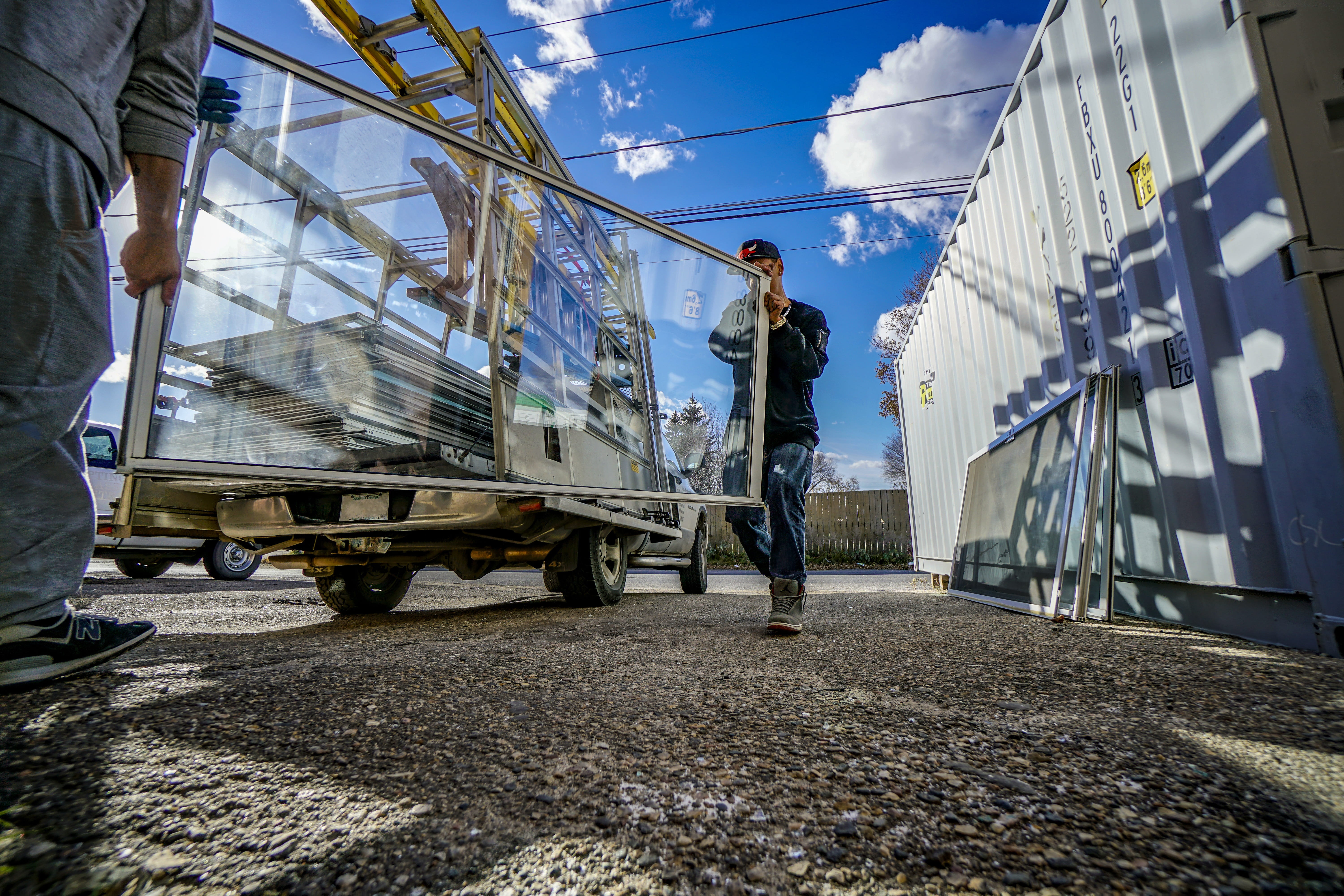 walking, day, glass movers, young adult, big windows, hard worker, glass transportation, lifestyles, sky, 5K, window mover, window installer, outdoors, HD Wallpaper