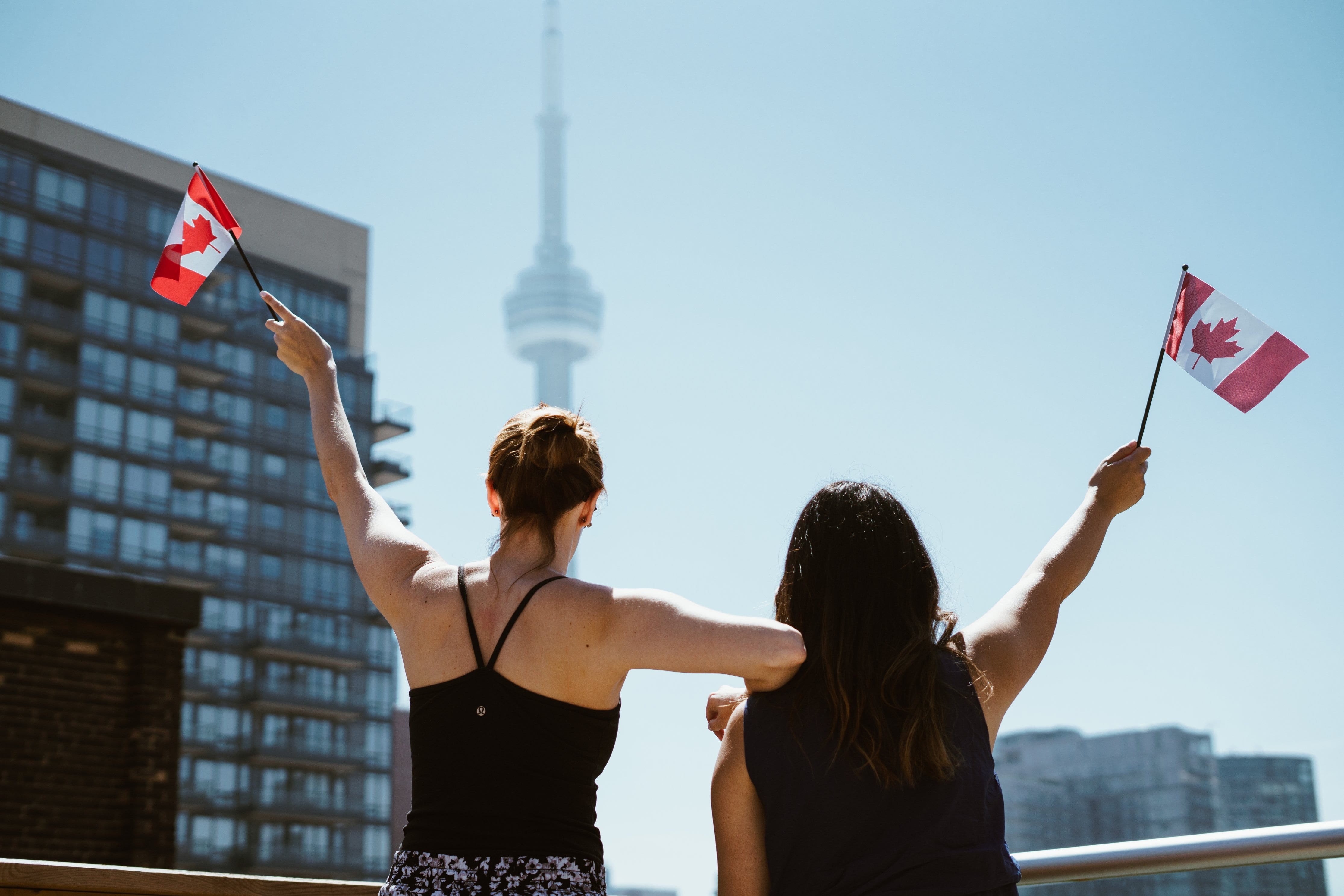 nature, two, facing, celebration, sky, city, canadian, flag, built structure, skyscraper, daytime, office building exterior, party, girls, emotion, architecture, HD Wallpaper