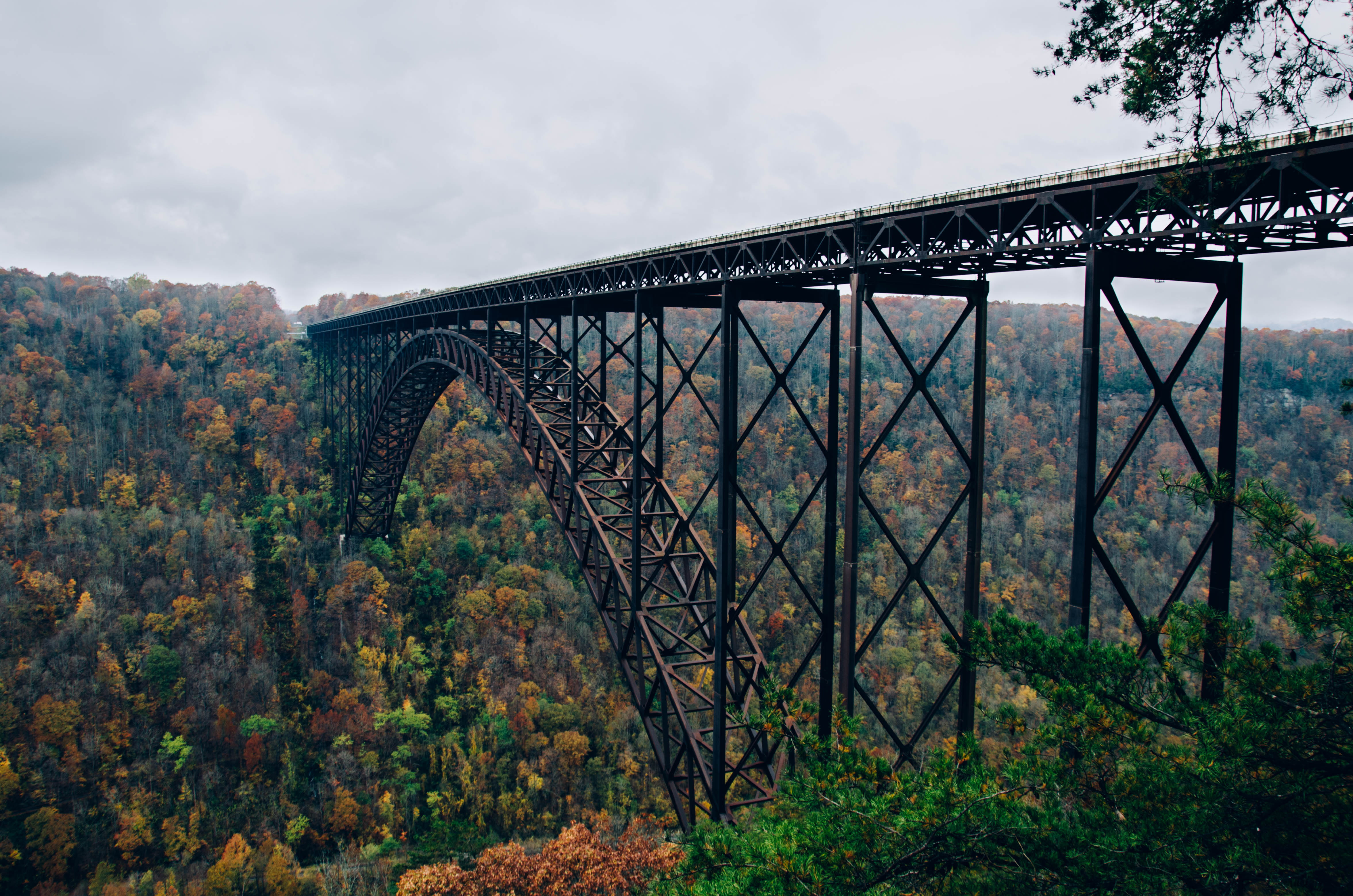 valley, arch, famous Place, greenery, land, forest, railway bridge, outdoors, plant, steel arch bridge, day, metal, architecture, rail transportation, cloud - sky, HD Wallpaper