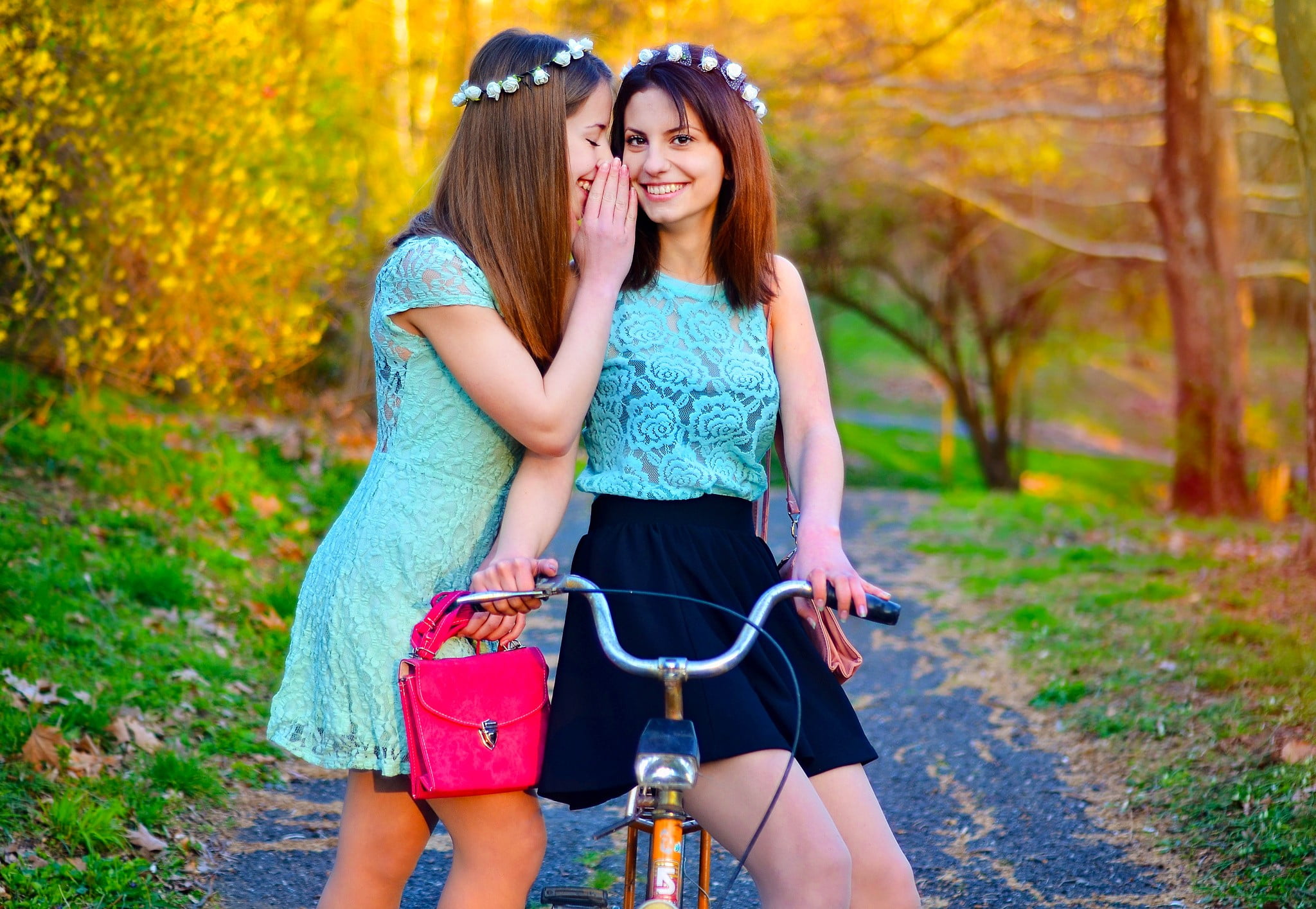 adult, wreaths, holding, whispering, nature, plant, riding, cap, tree, lifestyles, see-through blouse, togetherness, teenager, focus on foreground, women with bicycles, HD Wallpaper