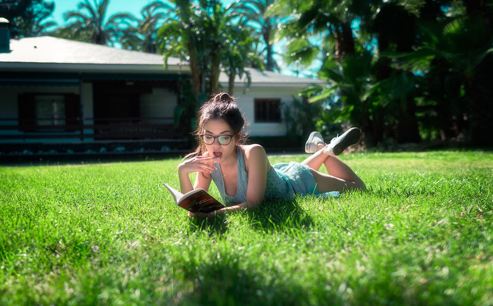 leisure activity, women outdoors, teenager, sunlight, plant, 720P, minidress, books, young adult, casual clothing, brunette, land, lifestyles, hairbun, HD Wallpaper