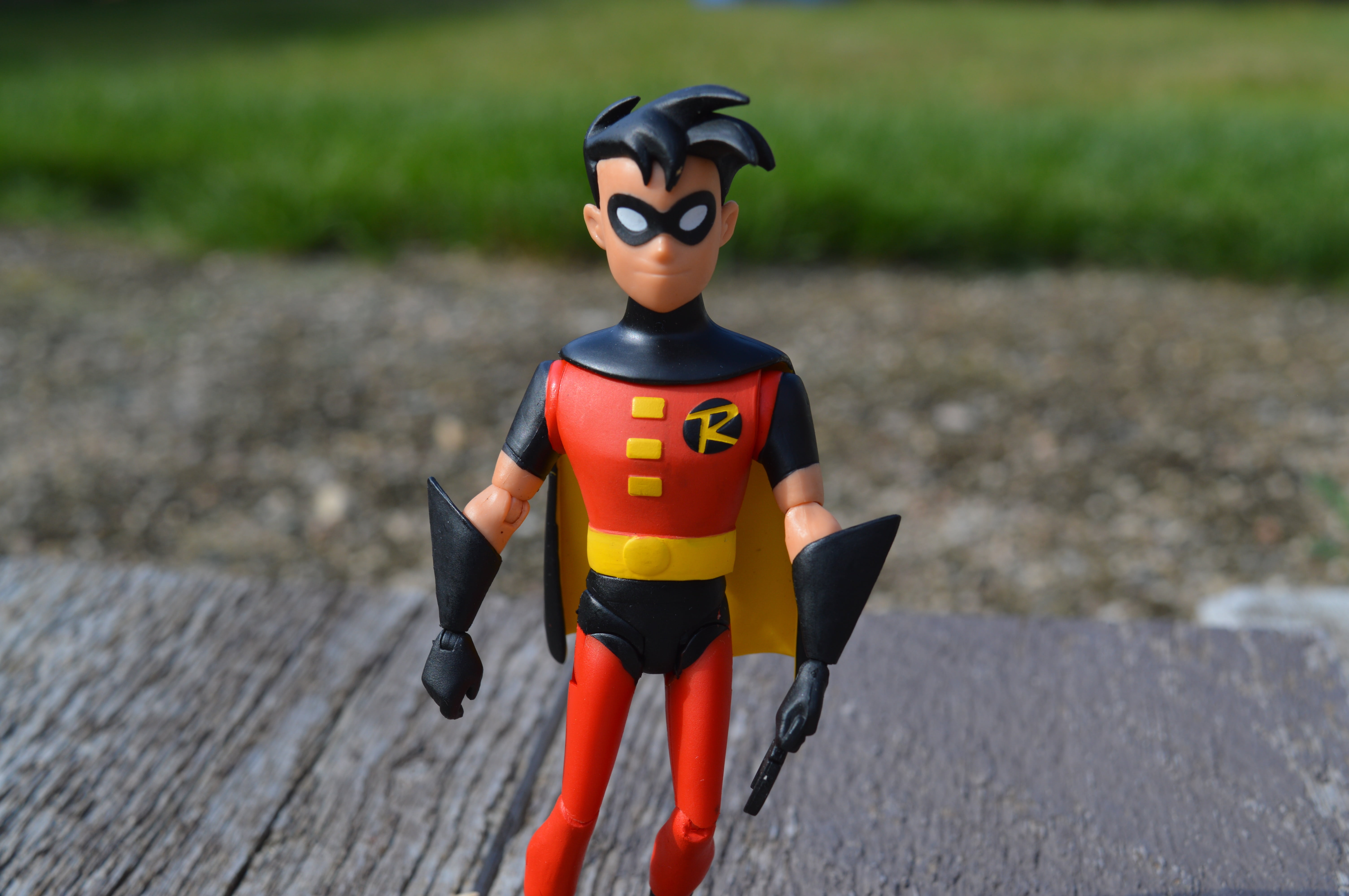 outdoors, focus on foreground, comic, man, costume, robin, leisure activity, toy, males, real people, superhero, person, male, action, boy, men, child, HD Wallpaper
