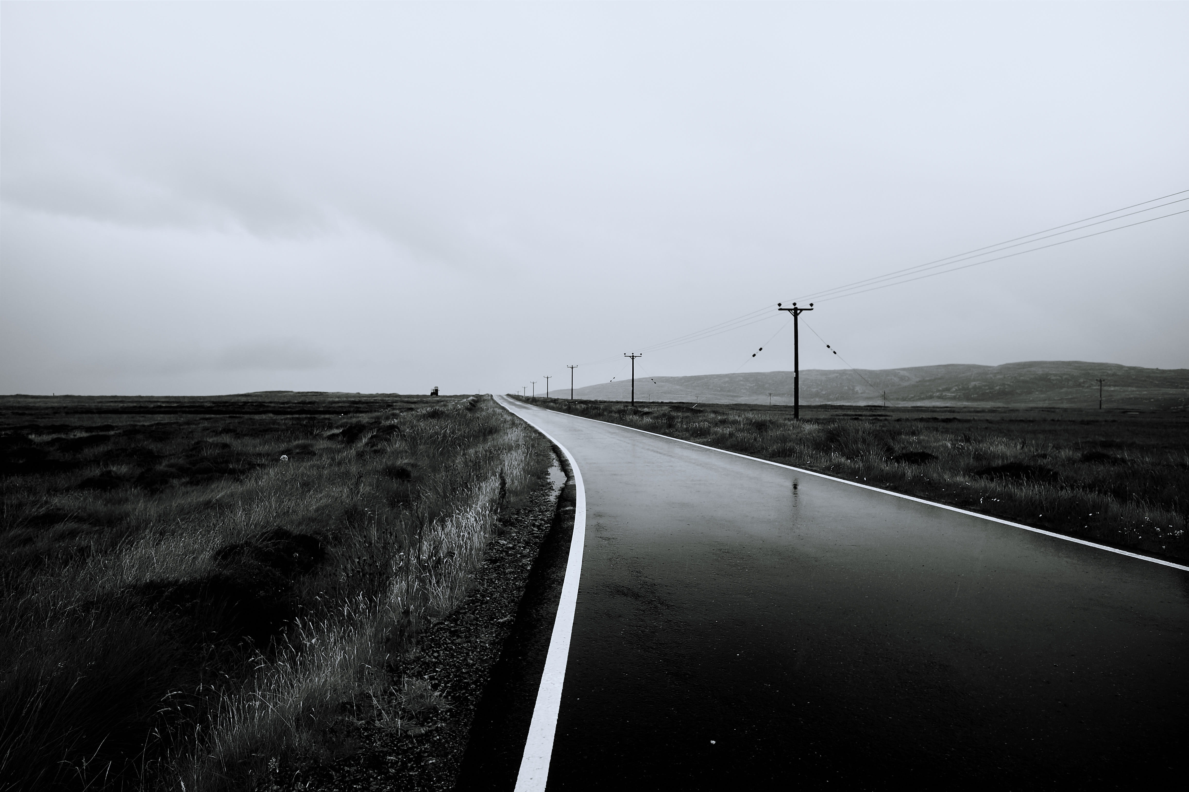 asphalt, gray, highland, power line, path, concrete, cloudy, no People, highway, rural Scene, scenics, sky, outdoor, grass, wet, blackandwhite, summer, HD Wallpaper