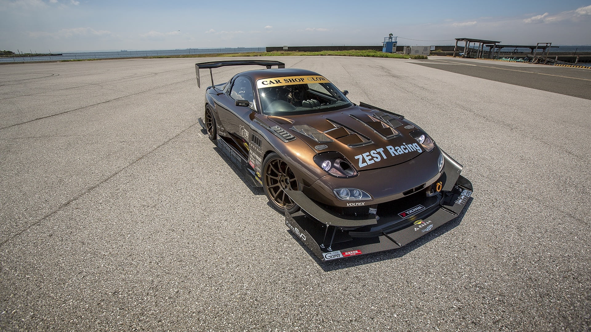 sunlight, Mazda RX7, airport runway, car, 1080P, sky, asphalt, auto racing, landscape, outdoors, high angle view, windows, no people, land vehicle, motor vehicle, HD Wallpaper