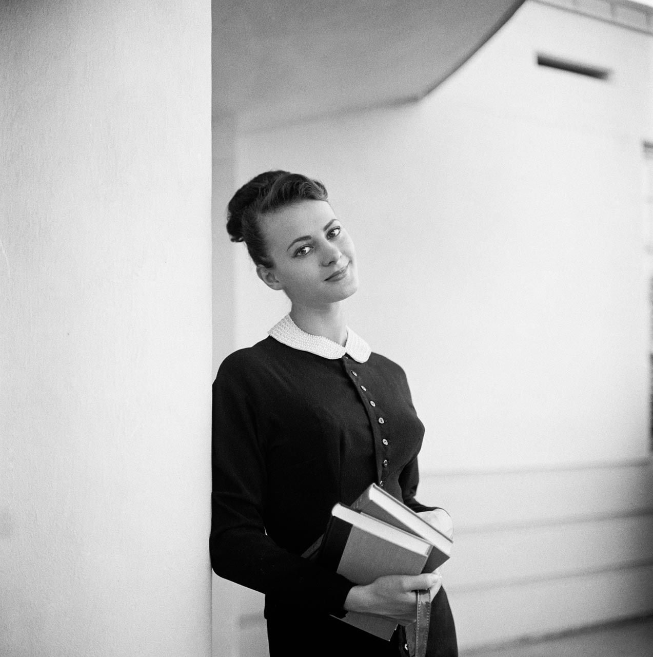 1950s, Virginia Gordon, one person, looking away, standing, waist up, book, adolescence, education, looking, women, young adult, learning, wall - building feature, Phone HD Wallpaper