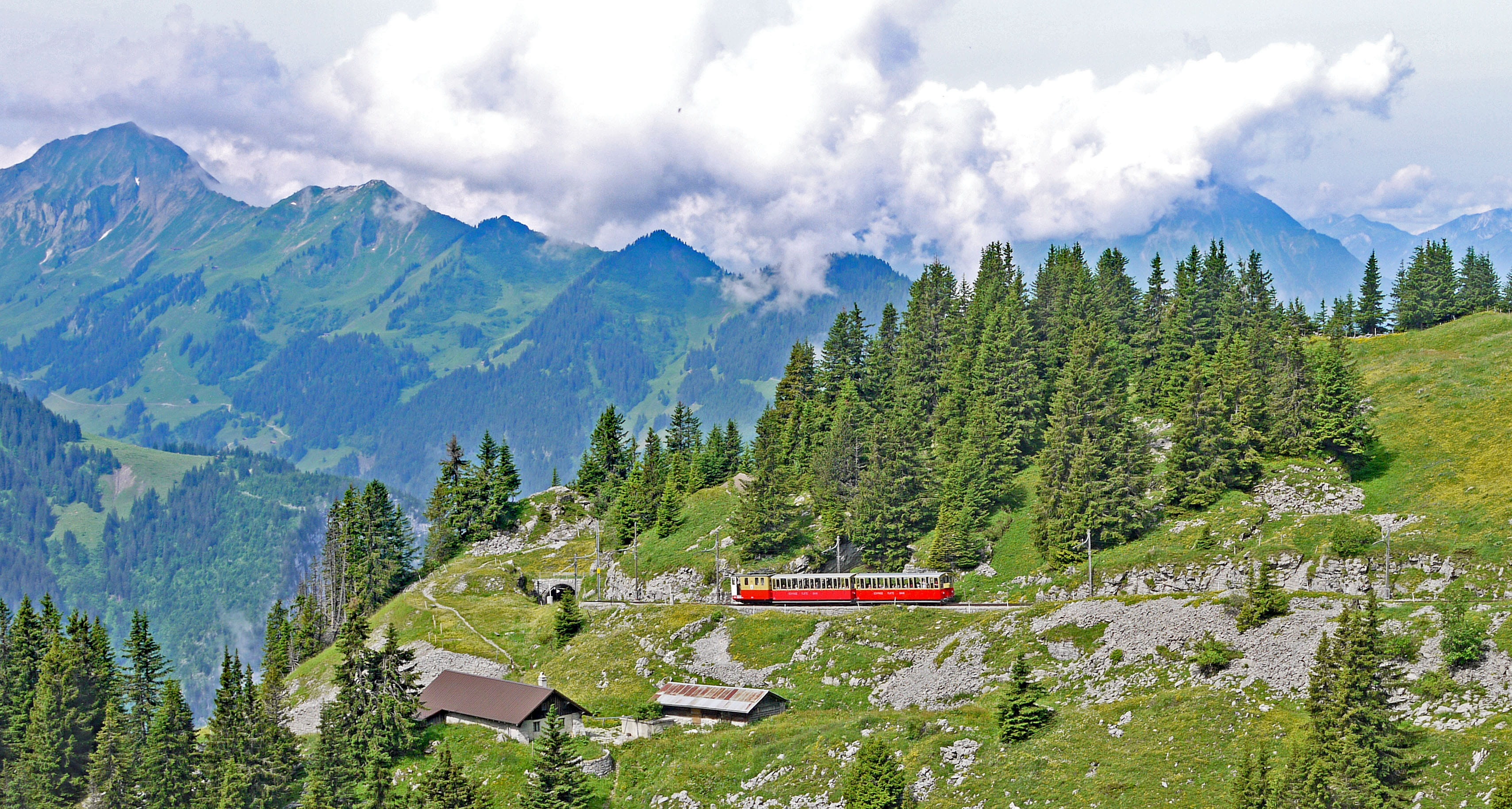 electric locomotive, mountain, sky, bernese oberland, outdoors, land, nature, coniferous tree, environment, green color, building exterior, built structure, HD Wallpaper
