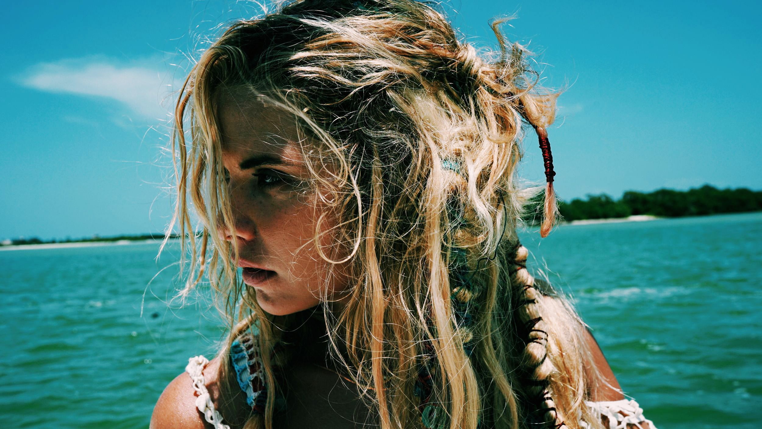 young women, depth of field, portrait, water, lifestyles, Ashley Benson, celebrity, day, beautiful woman, beach, blond hair, hair, wind, one person, young adult, HD Wallpaper