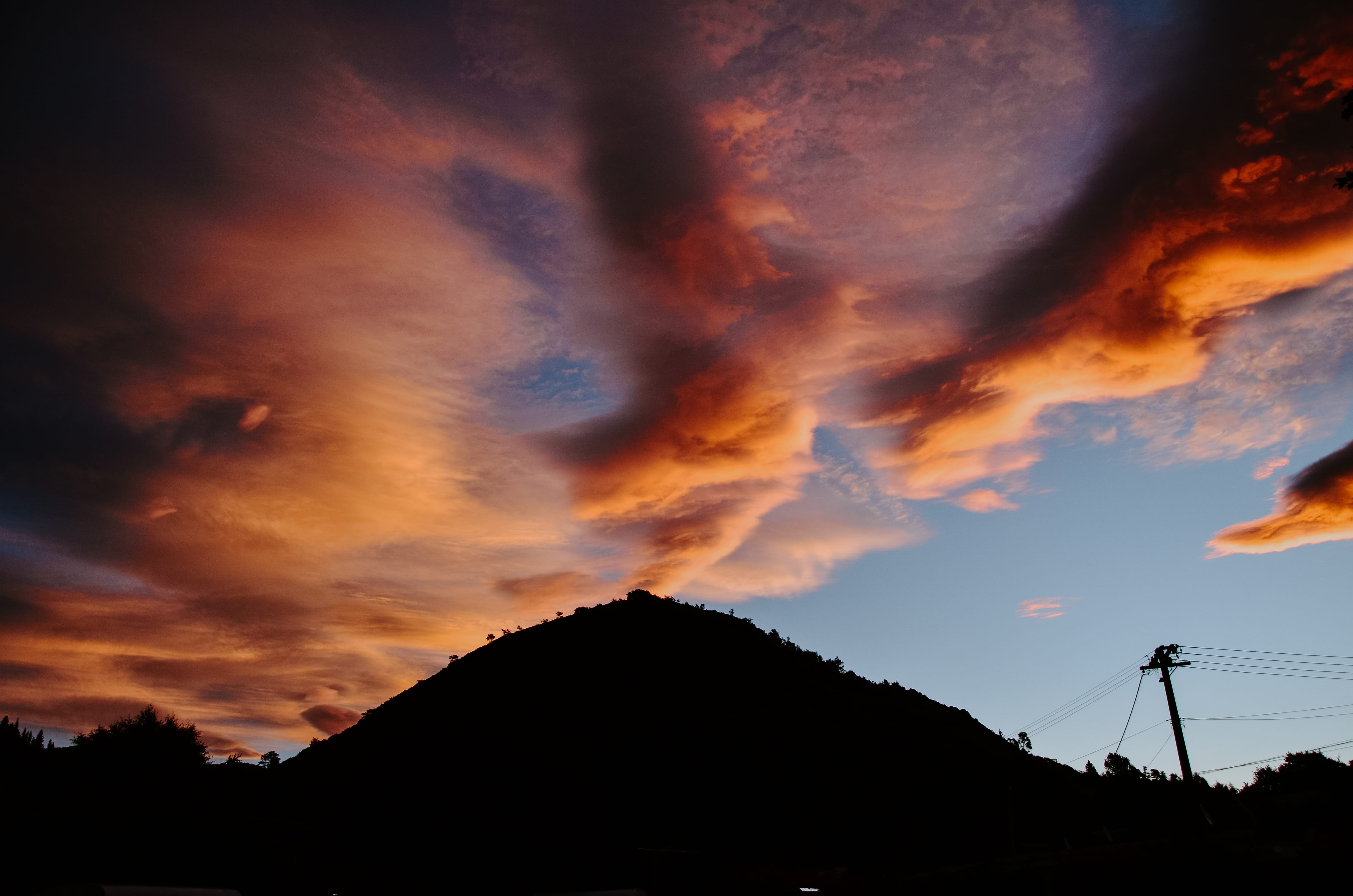 orange color, non-urban scene, power supply, hill, sunset, sky, mountain peak, beauty in nature, 4K, cloud - sky, electricity, mountain range, dramatic sky, HD Wallpaper