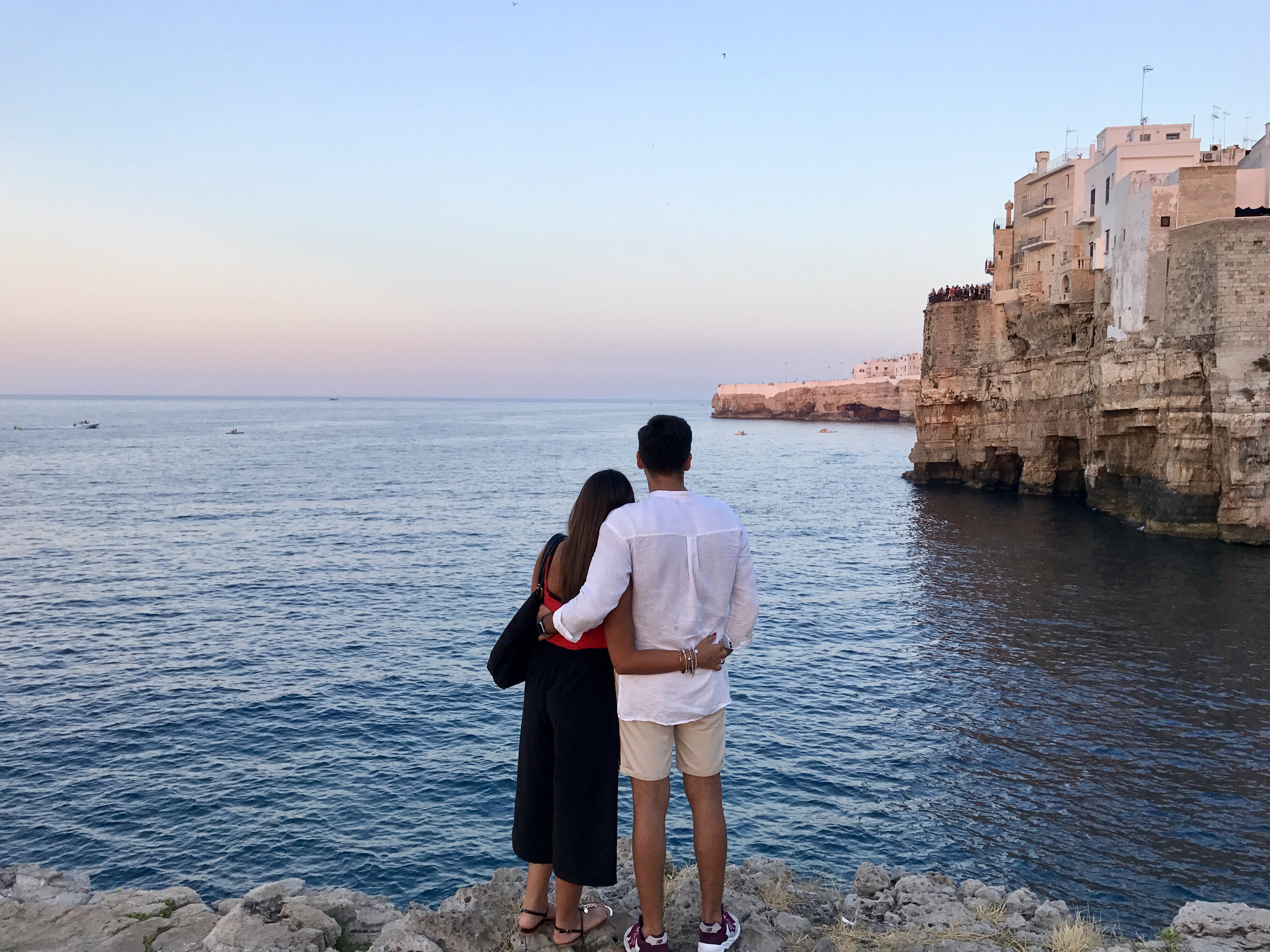 watching, lifestyles, buildings, rocks, puglia, bonding, shirt, calm, horizon over water, sea, daytime, travel, concrete, ocean, tourism, casual clothing, HD Wallpaper