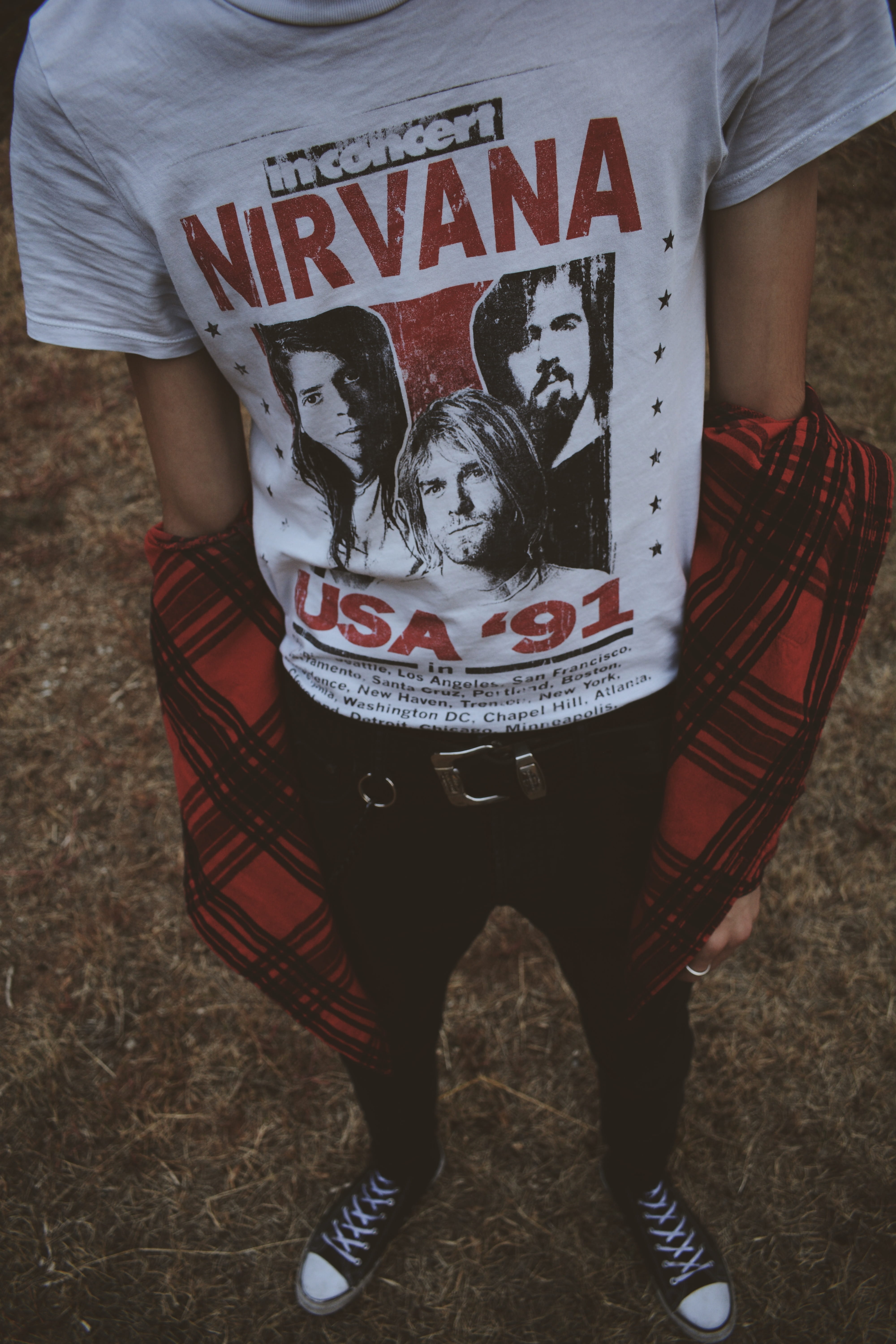 casual clothing, man, nirvana, real people, men, red, women, text, standing, field, white, lifestyles, western script, guy, t-shirt, leisure activity, person, Phone HD Wallpaper