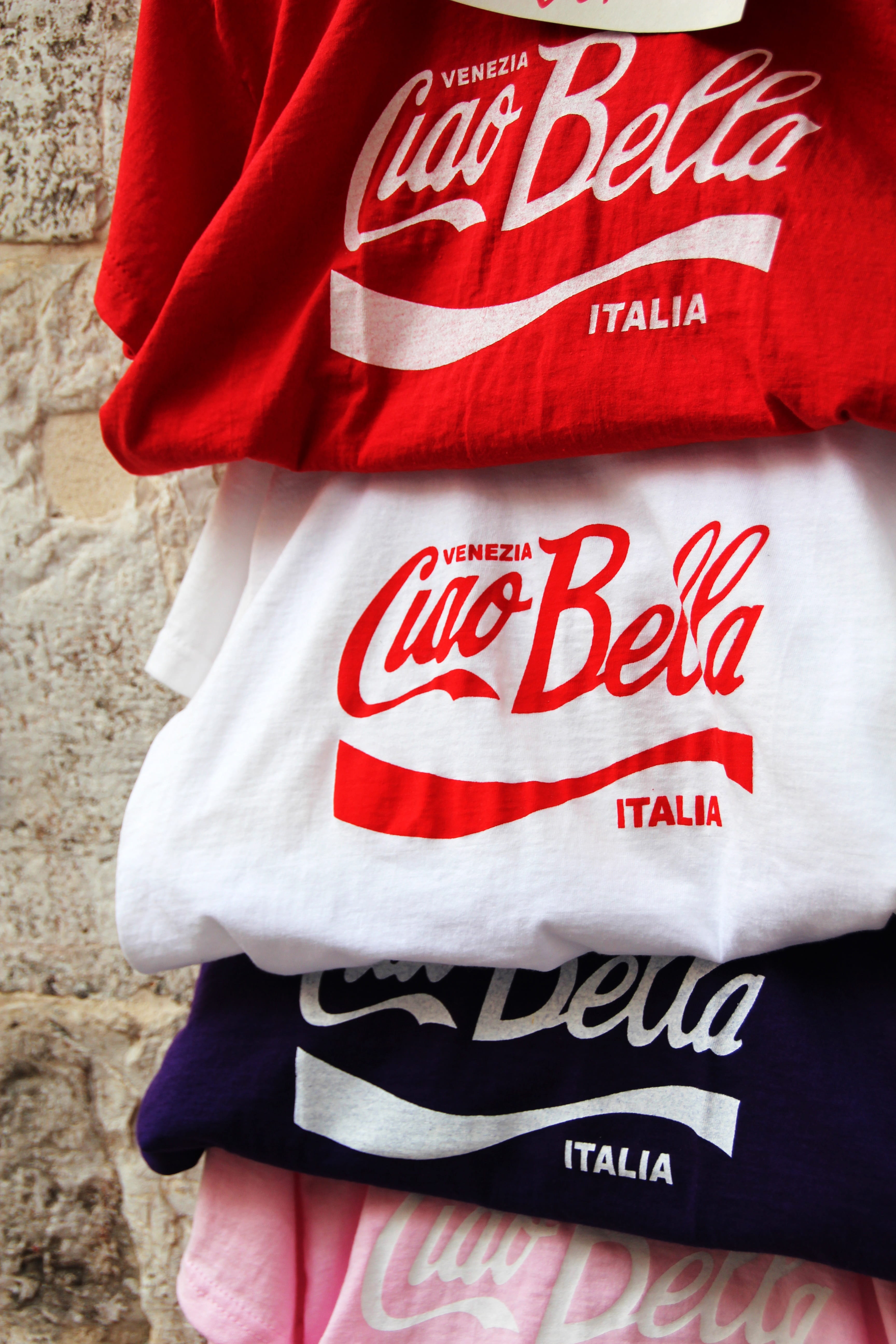 coca, design, communication, souvenir, real people, clothing, t shirts, leisure activity, day, color, close-up, text, outdoors, shirts, ciao bella, white color, Phone HD Wallpaper