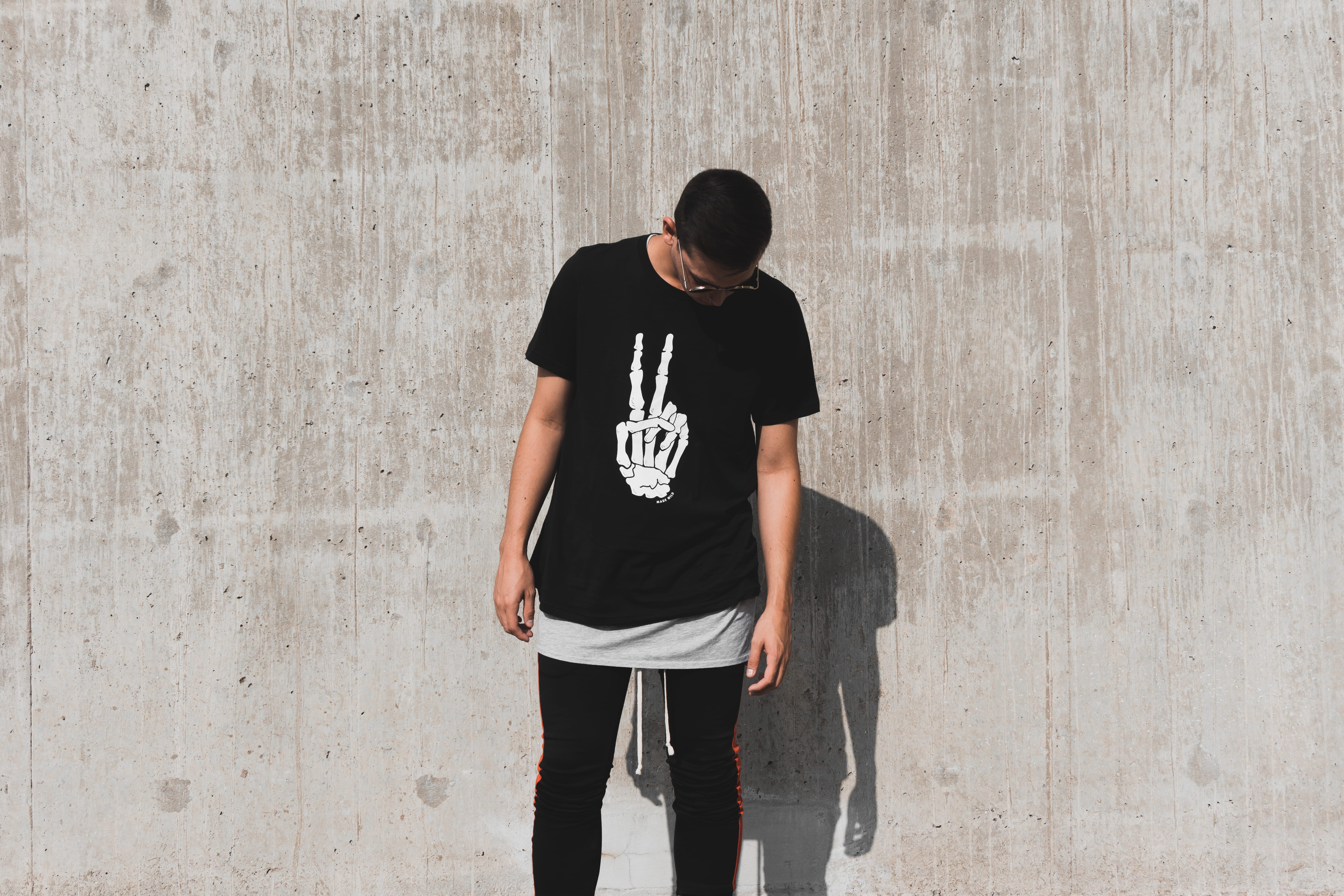 one person, hype, real people, wall, new, looking, t-shirt design, style, portrait, young adult, denver, person, jeans, daytime, standing, built structure, HD Wallpaper